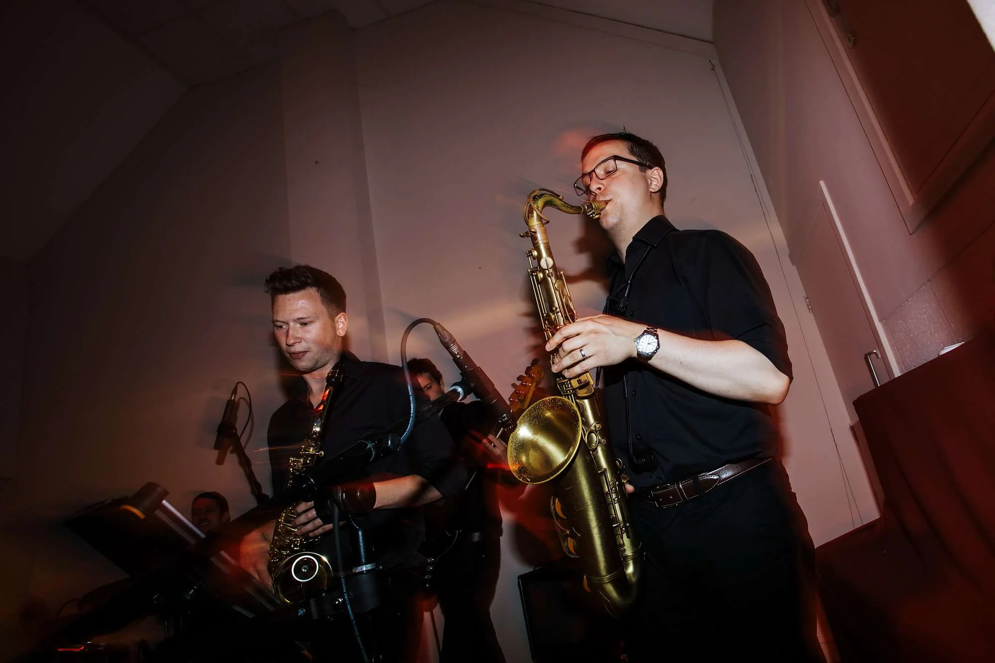 Two saxophones in a wedding band at East Keswick Village Hall Leeds