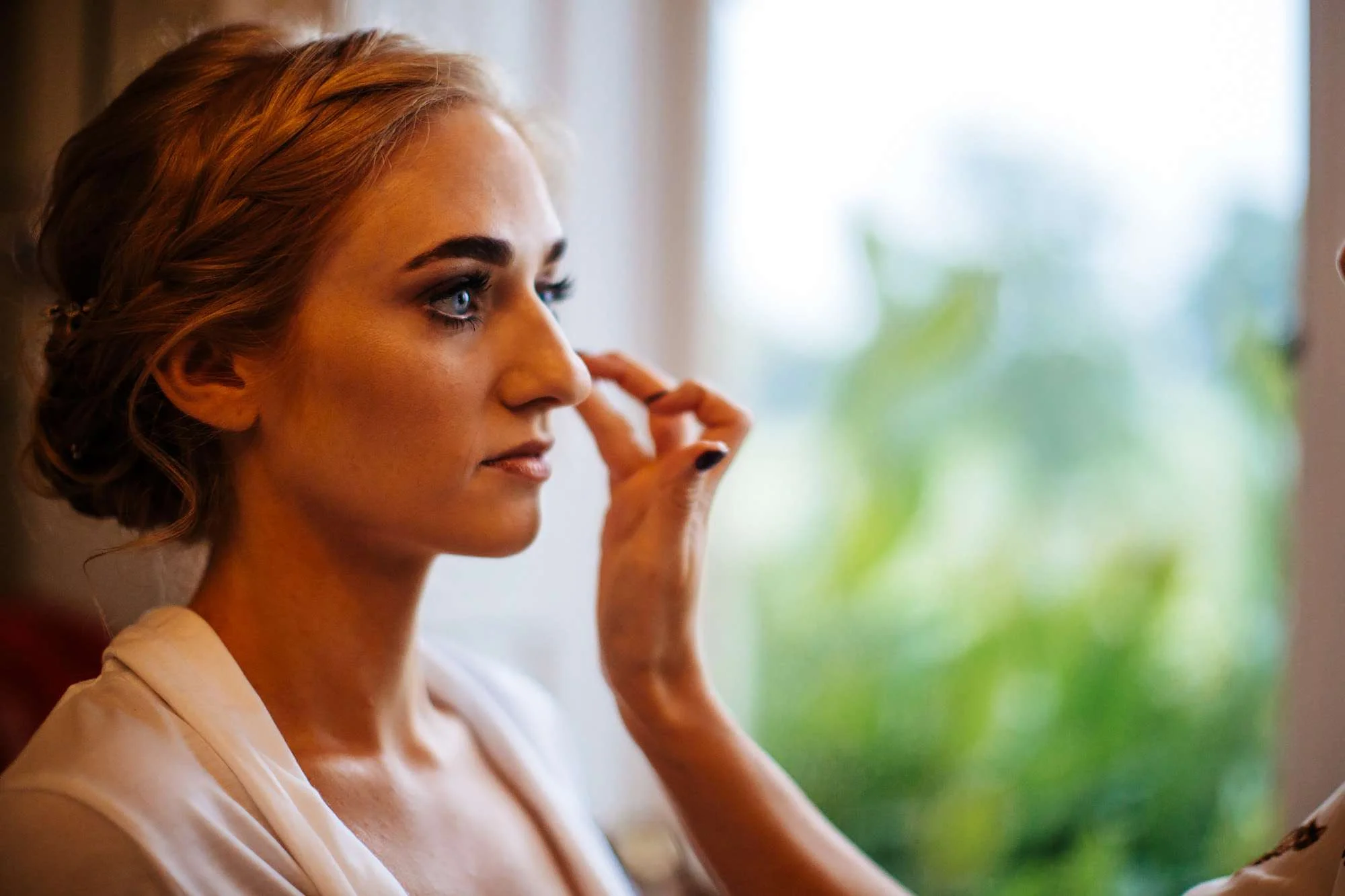 Bride getting ready before her wedding