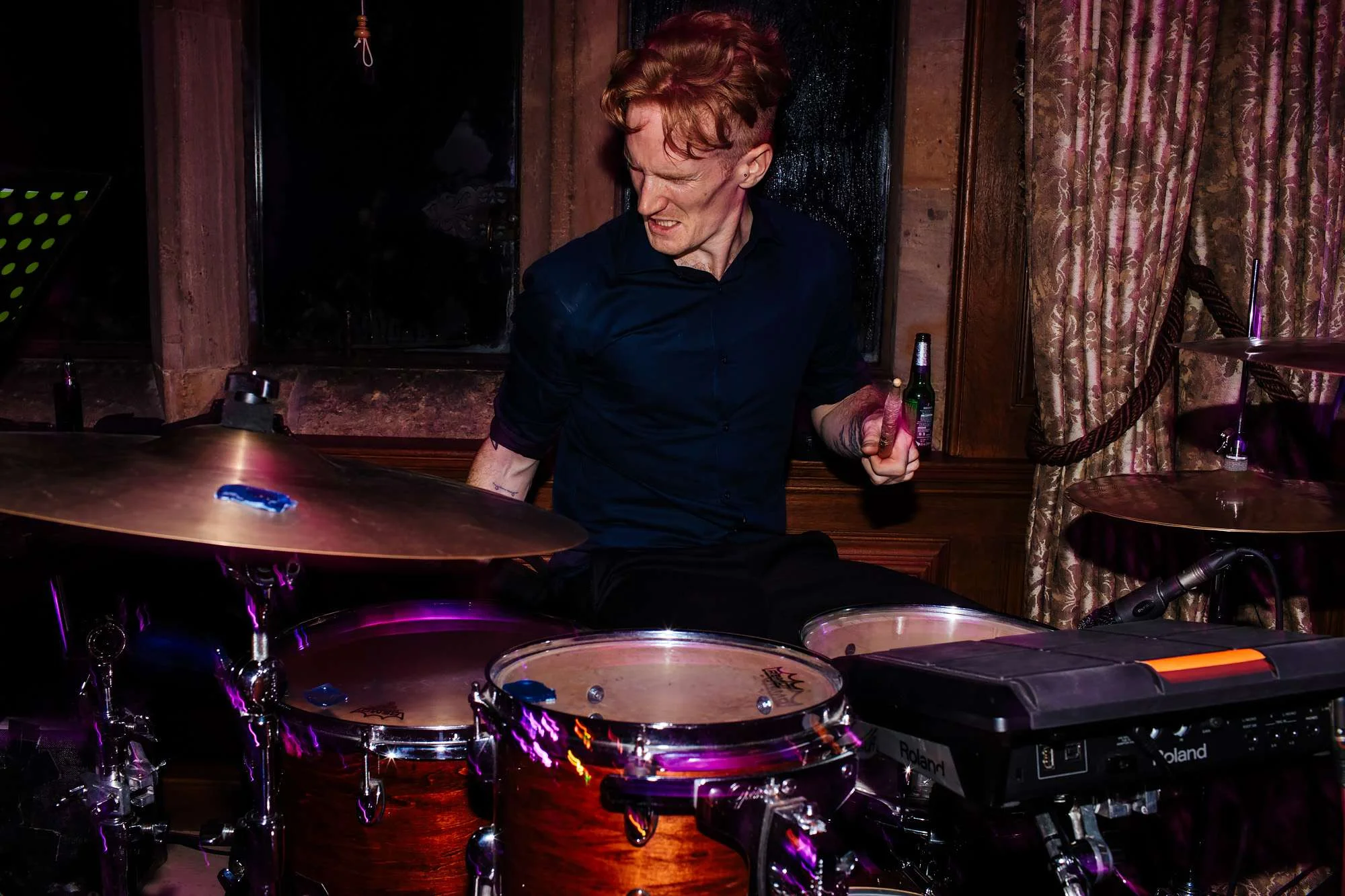 Drummer in the band at a wedding at Cowdray House