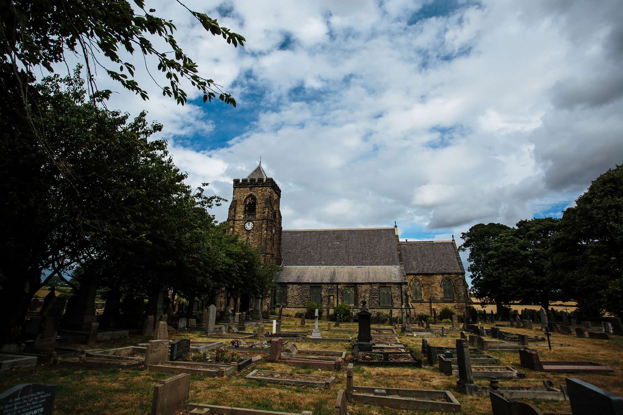 Church exterior with graveyard