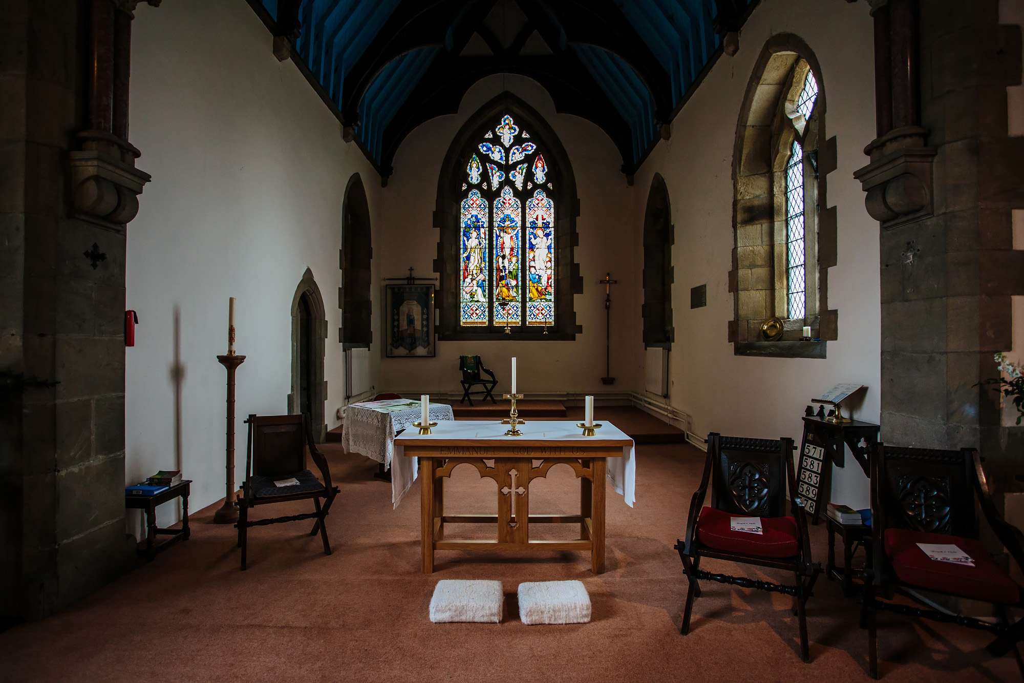 Church alter with stained glass window