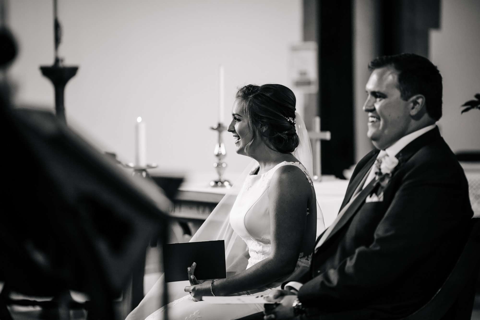 Bride and groom laughing at their Huddersfield wedding