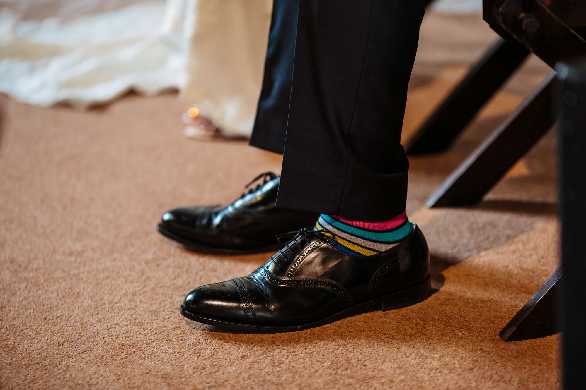 Groom's colourful socks at a wedding in Yorkshire