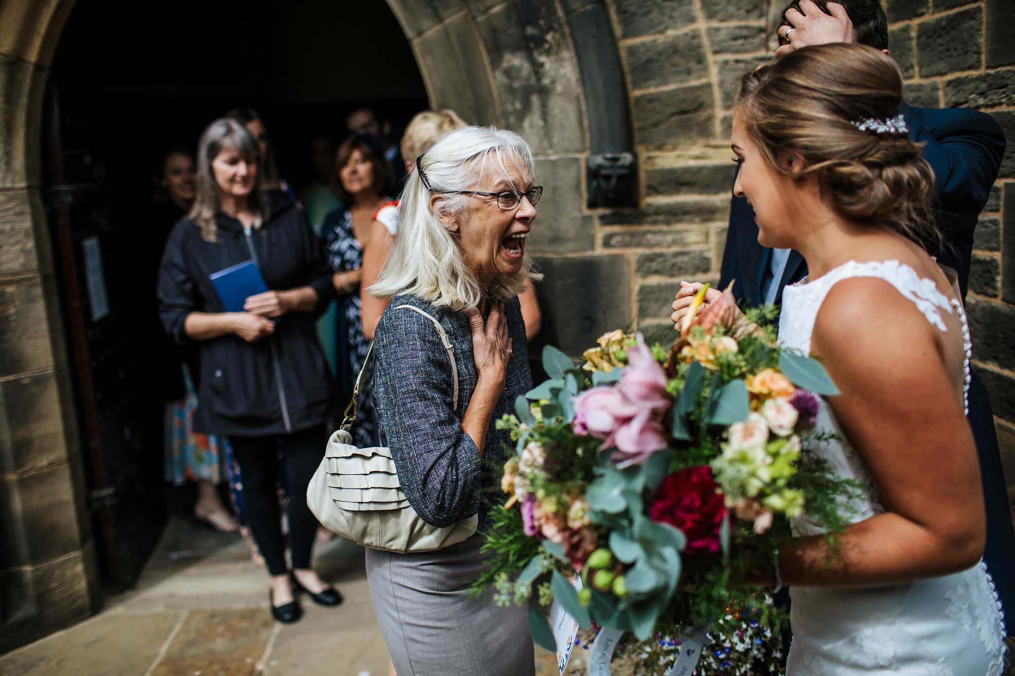 Guests laughing at a Yorkshire wedding