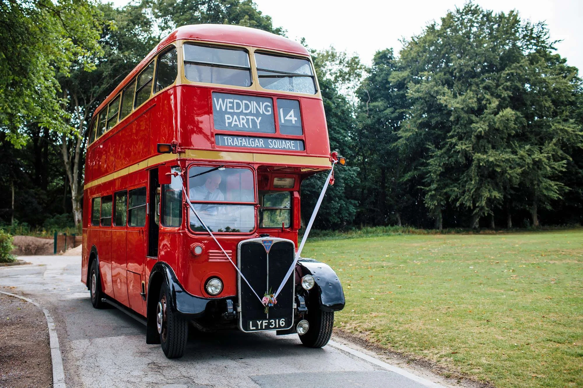 Vintage red double decker bus for a wedding party