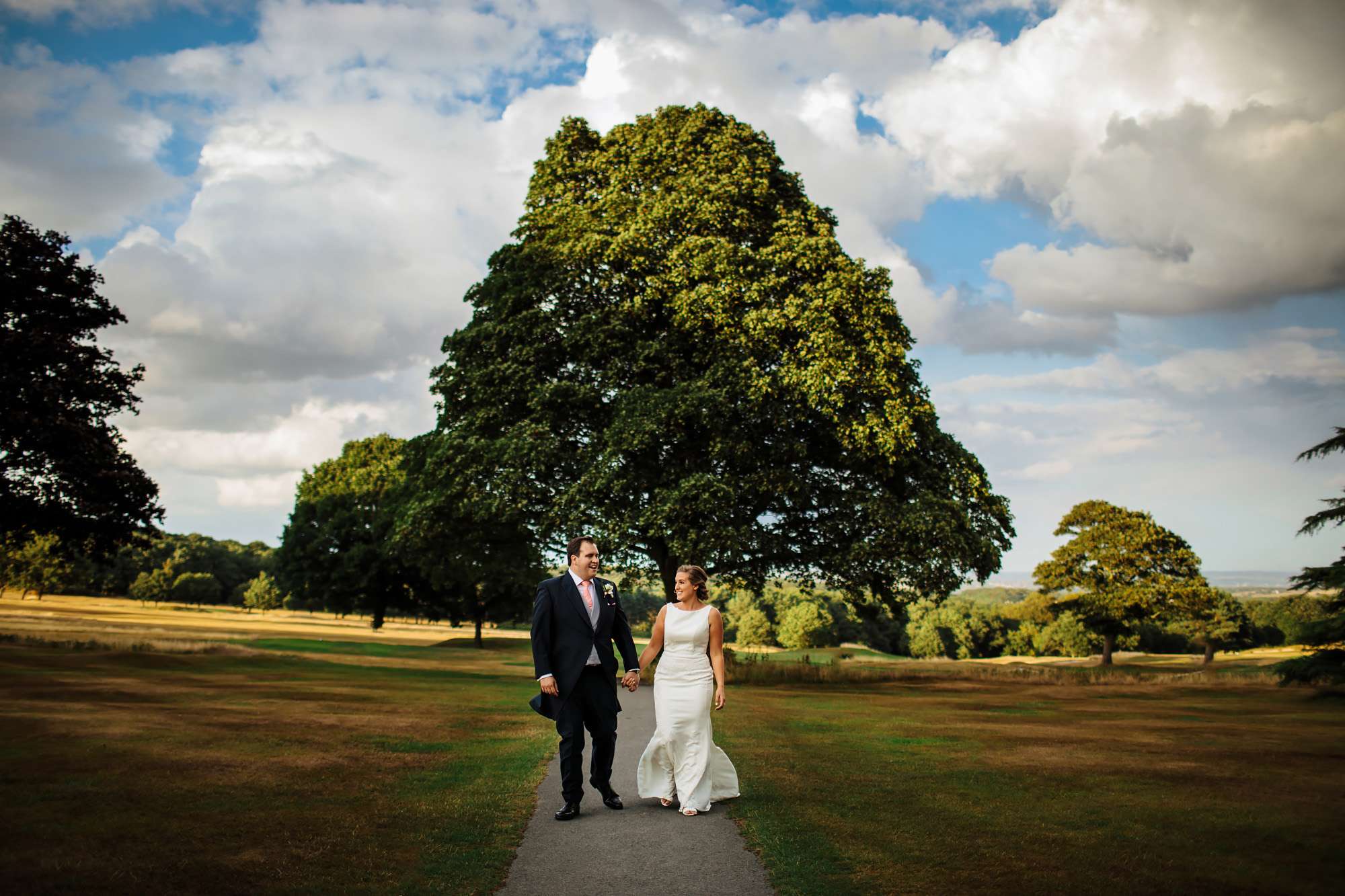 Bride and groom laughing on their wedding day