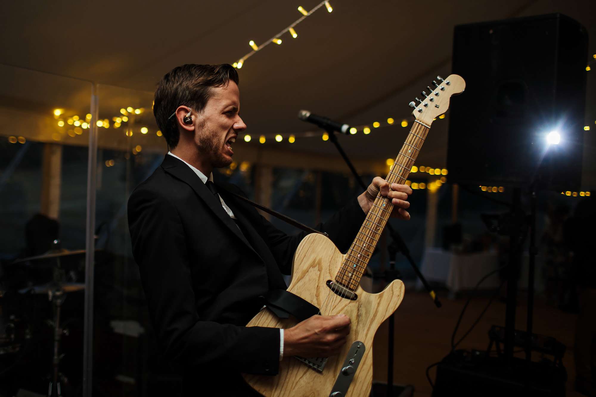 Guitarist performing at a wedding at Fixby Hall
