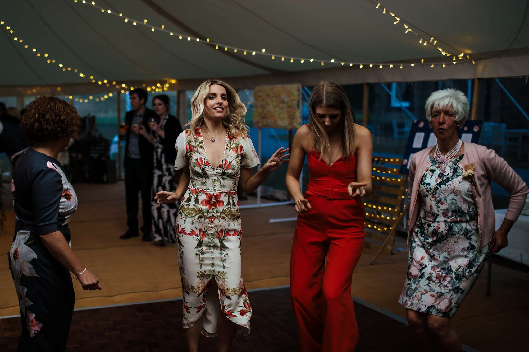 Wedding guests dancing in a marquee at Fixby Hall