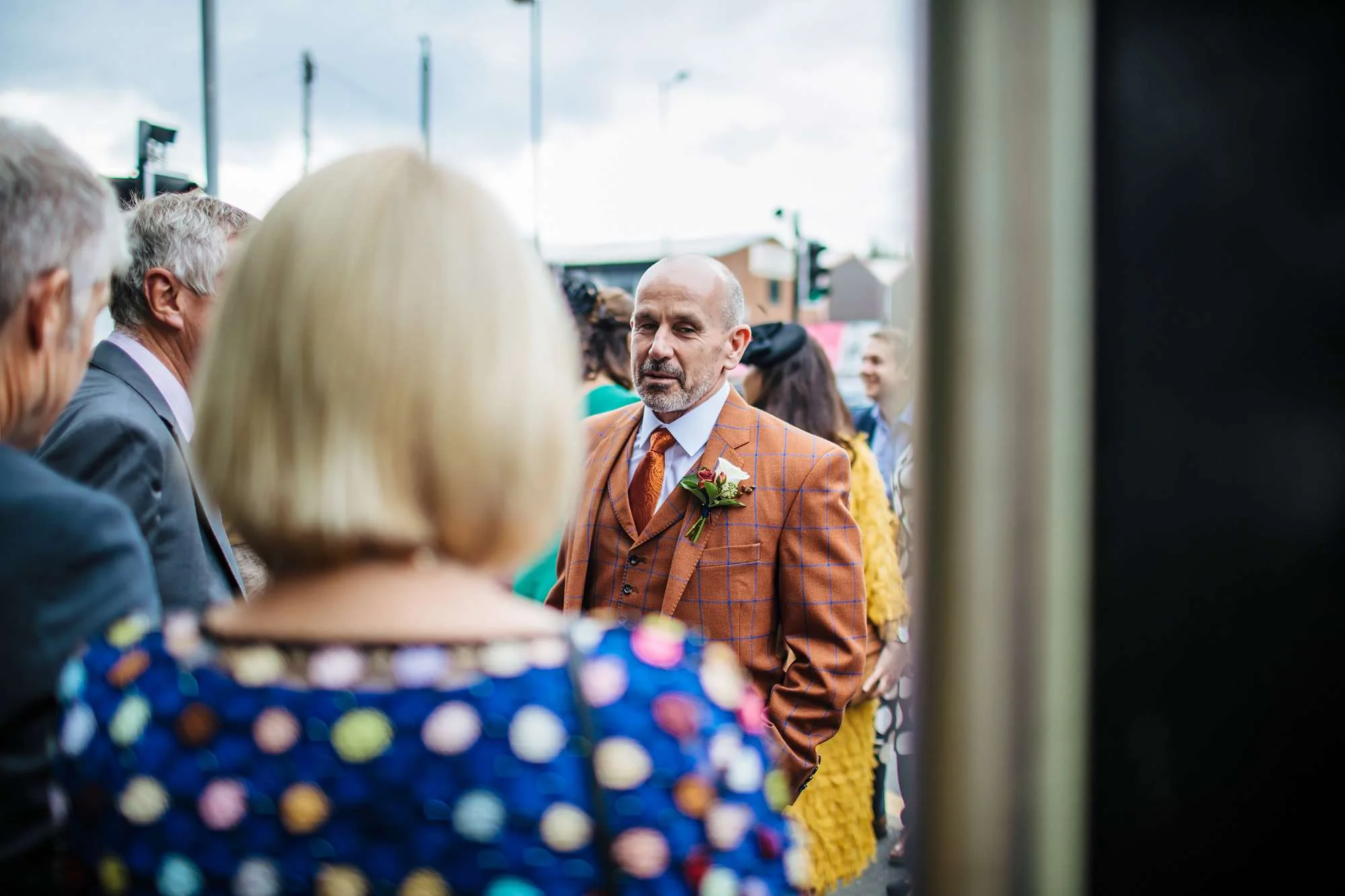 Groom chats to guests on his wedding day