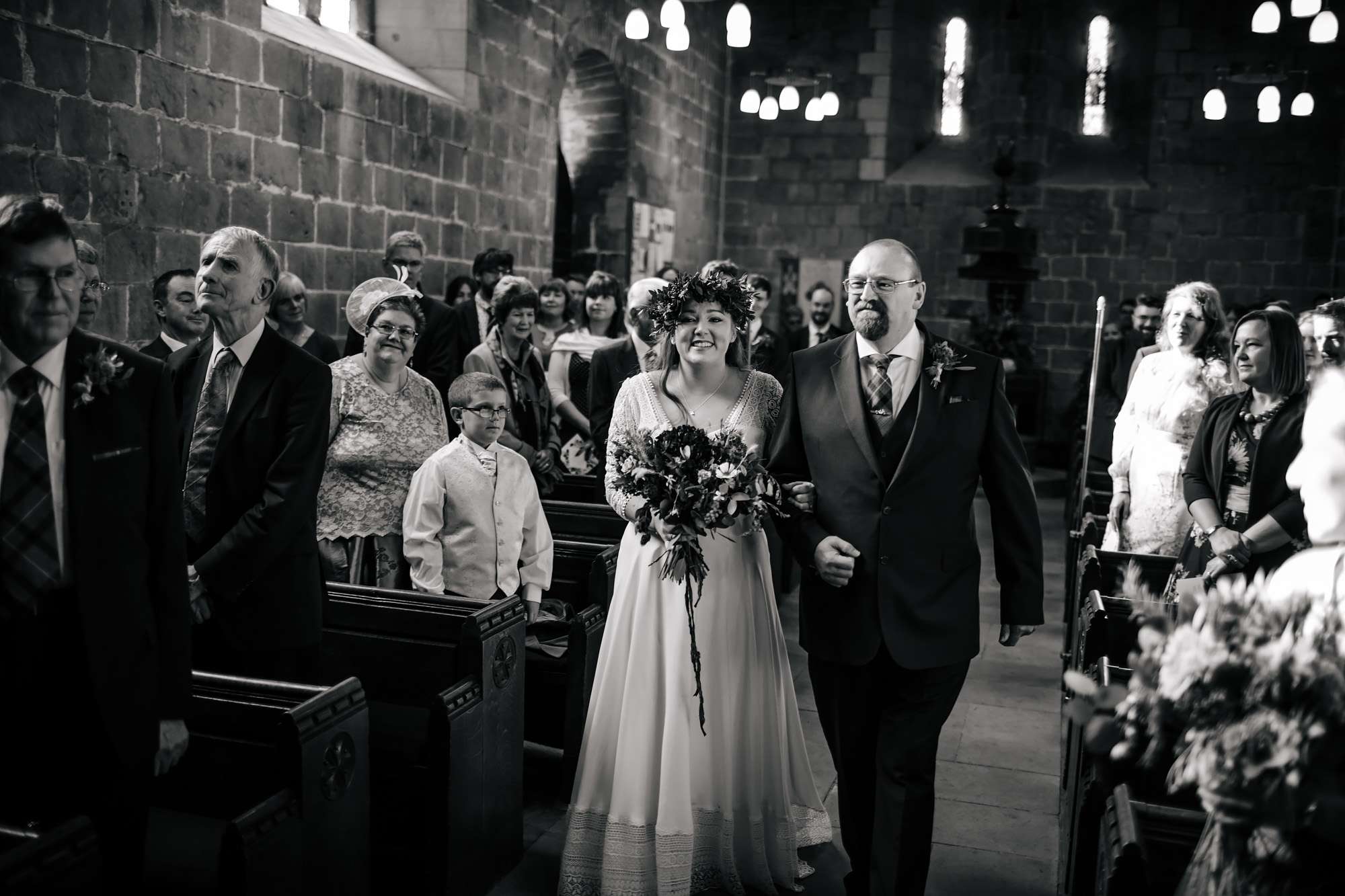 Bride and dad walk down the church aisle in Leeds