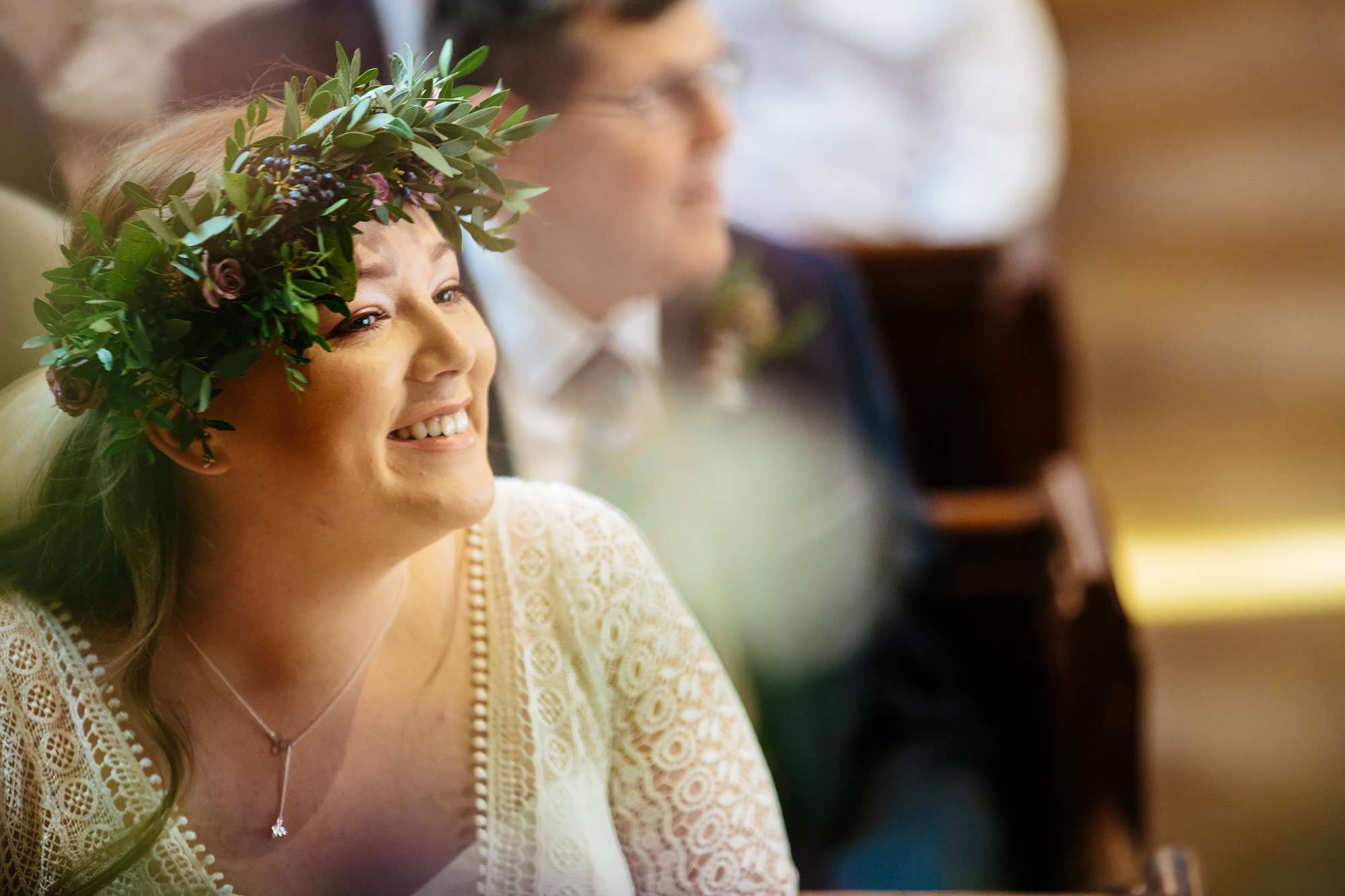 Bride smiles during her church wedding ceremony