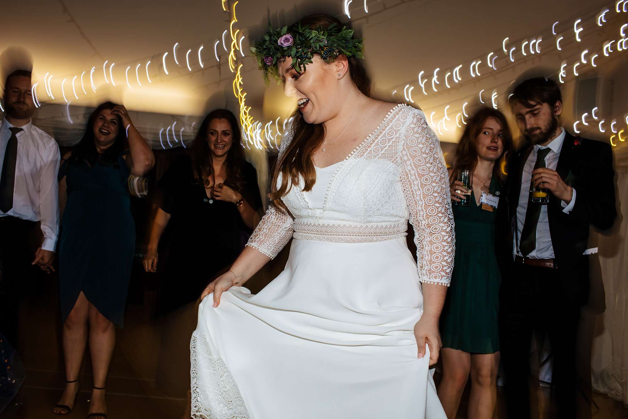 Bride on the dance floor at her wedding at East Keswick Village Hall