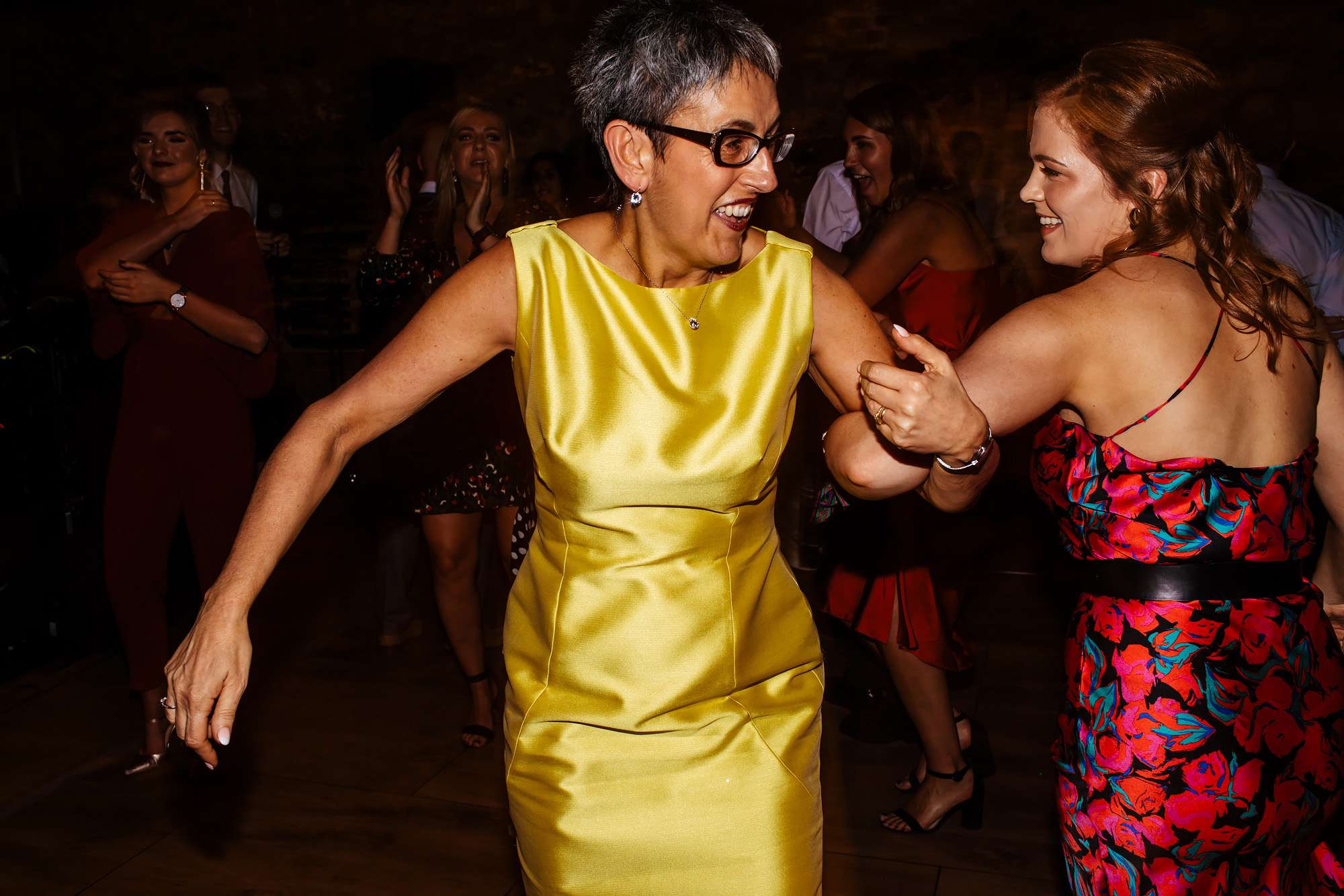 Mother of the bride dancing at her wedding