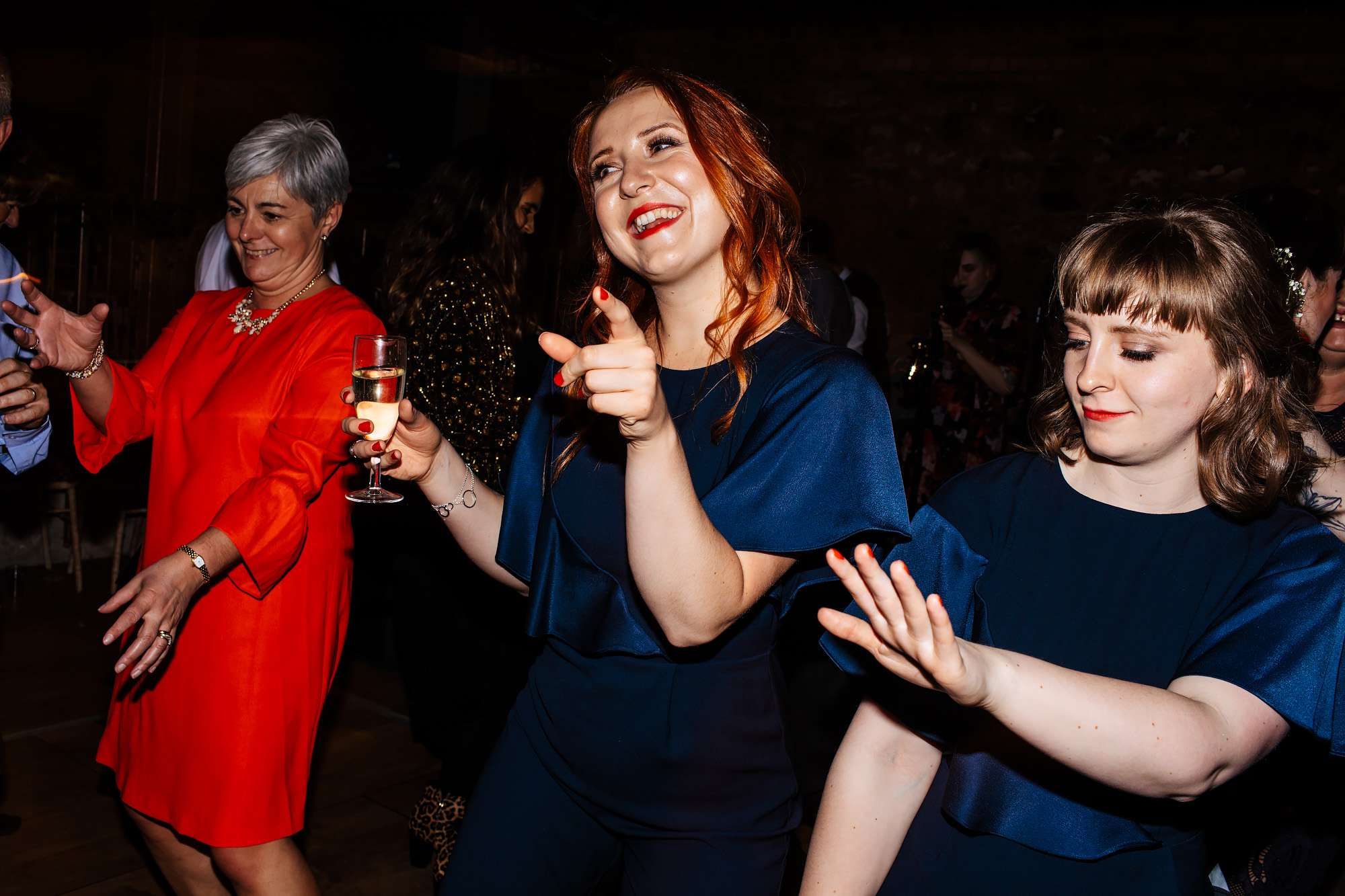 Bridesmaids dancing at a wedding in Fife