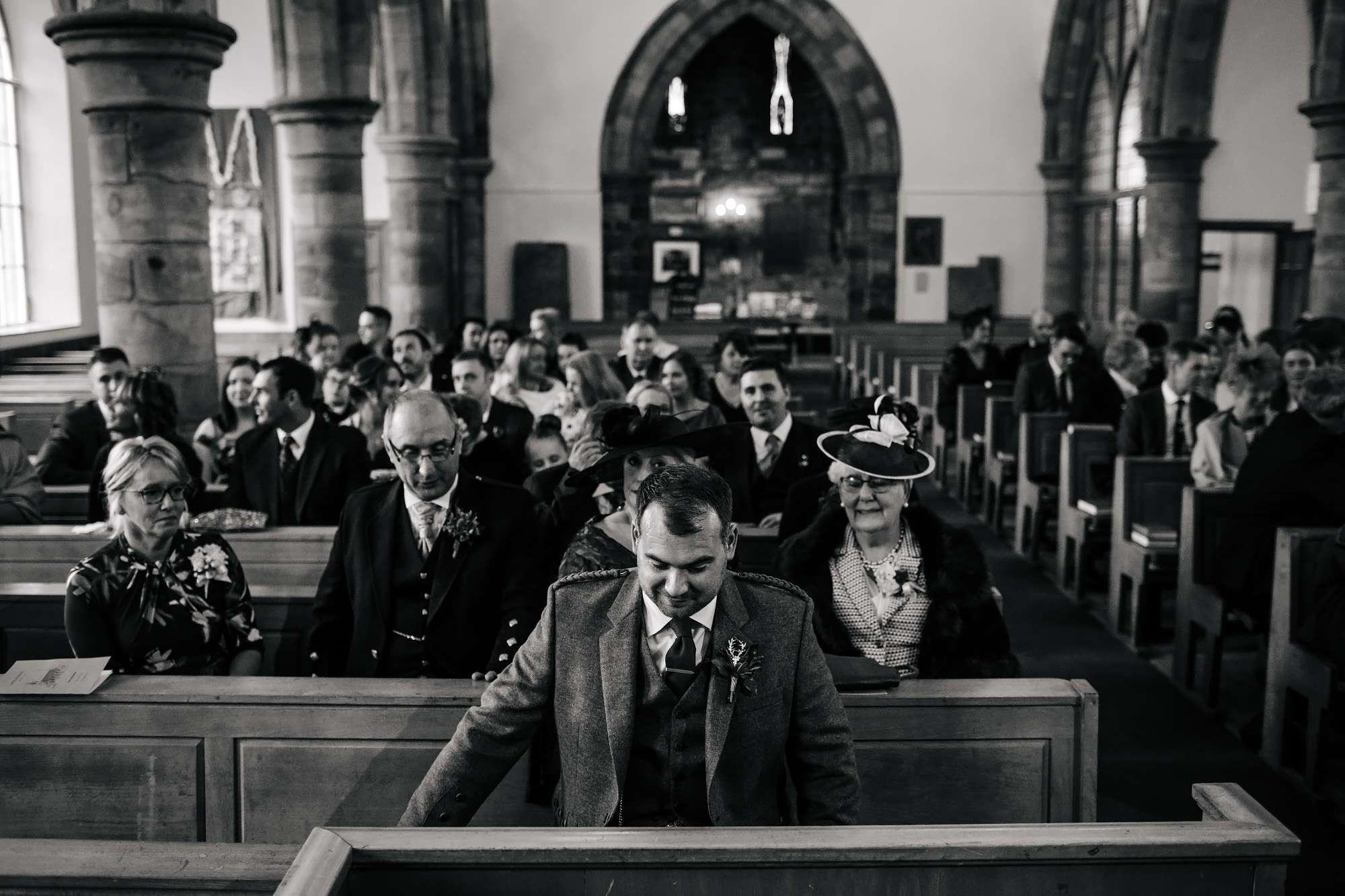 Groom waiting for his bride at Crail Kirk