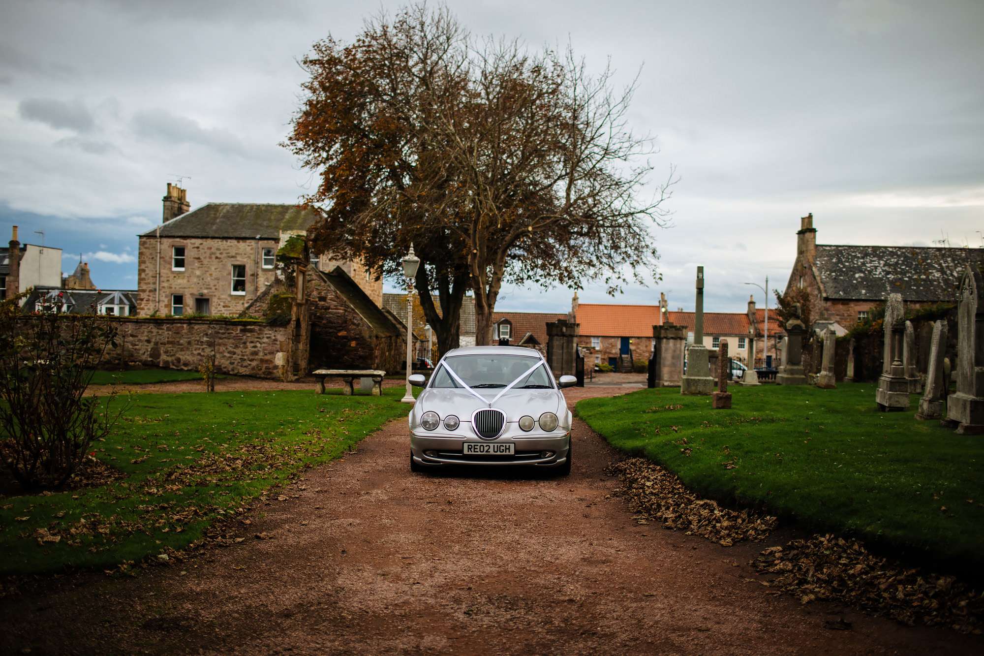 Bride arriving in the wedding car in Crail