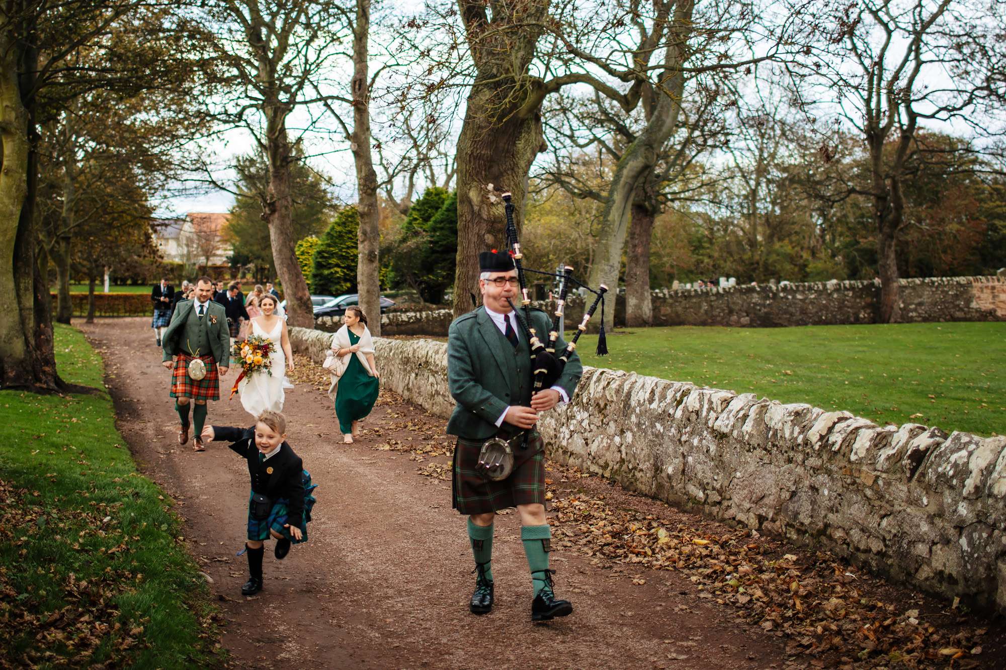 Piper at a wedding in Scotland