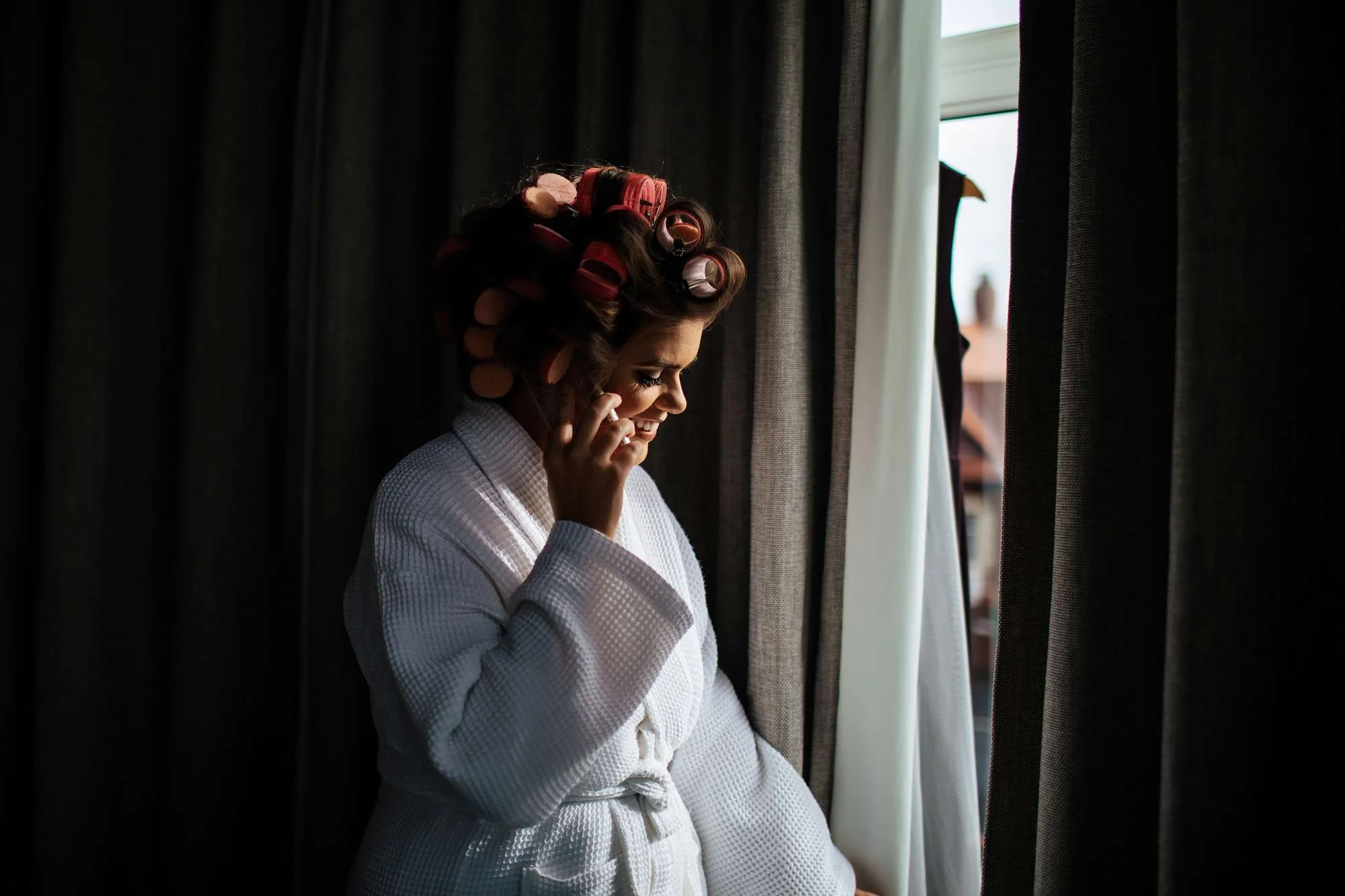 Bride on her wedding morning getting ready