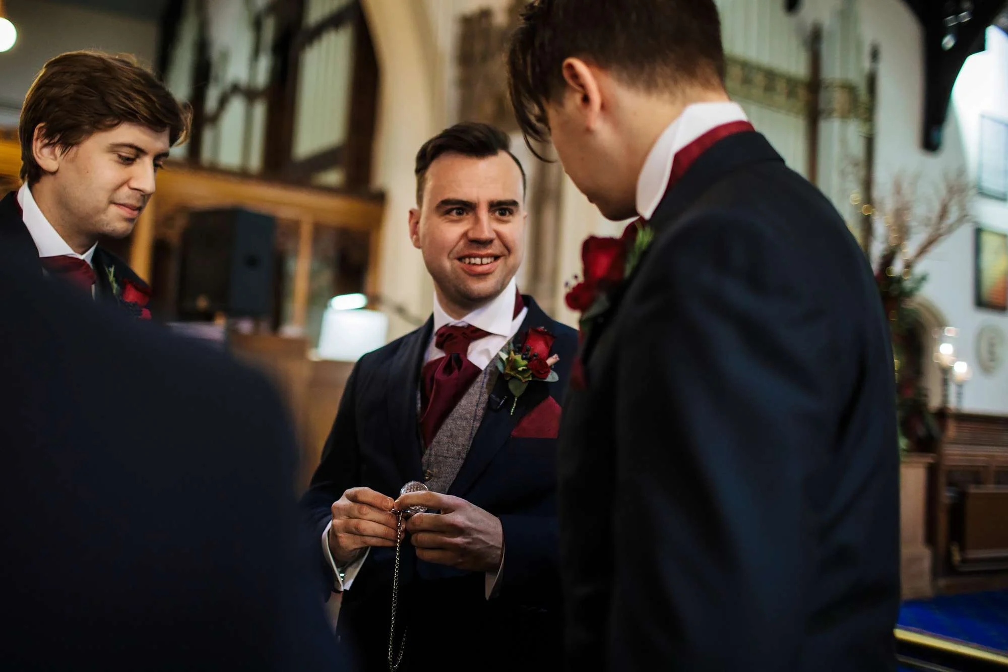 Groom joking with his groomsmen at a Blackpool wedding