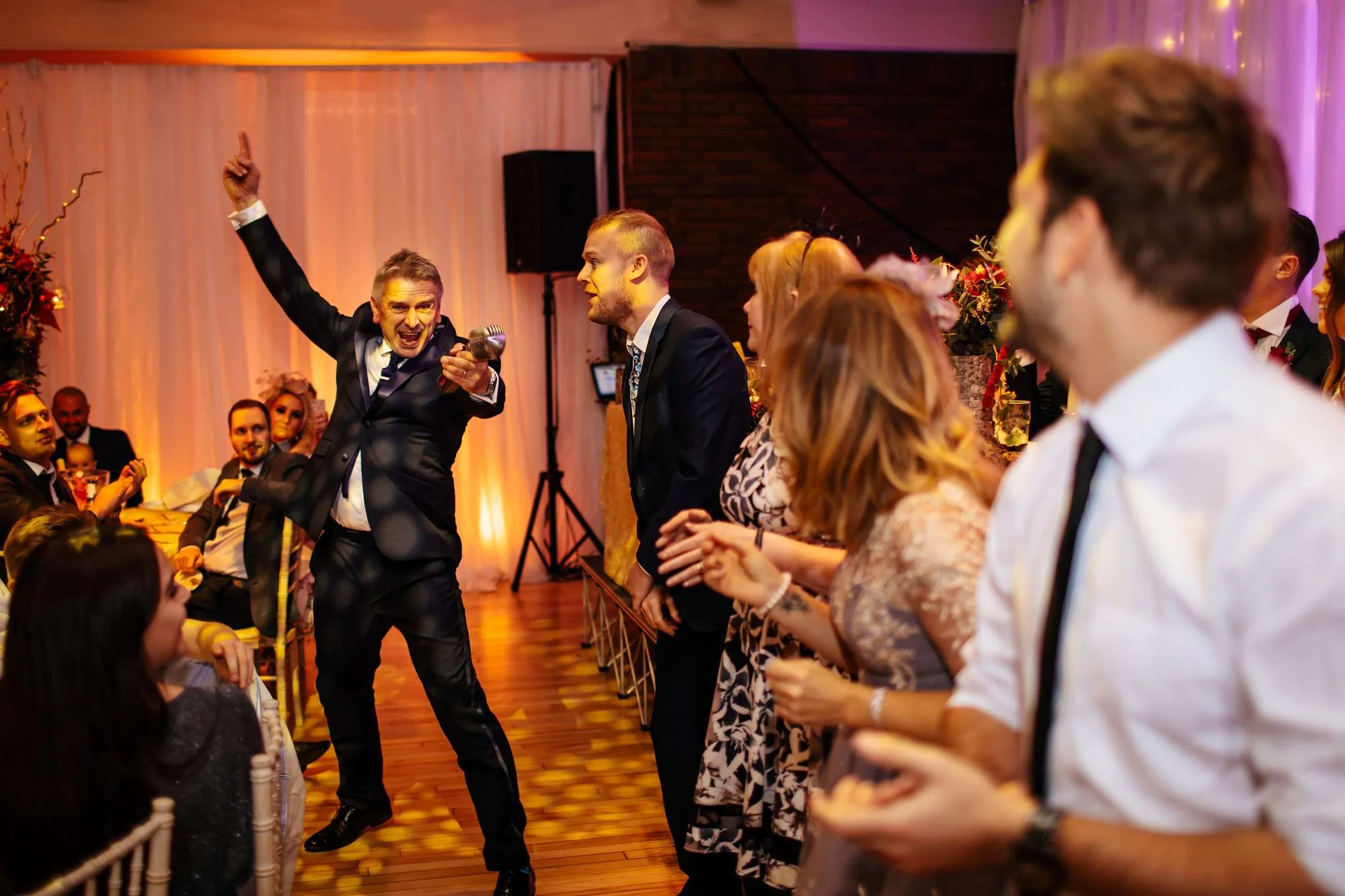 Wedding guests dancing at their tables in Blackpool