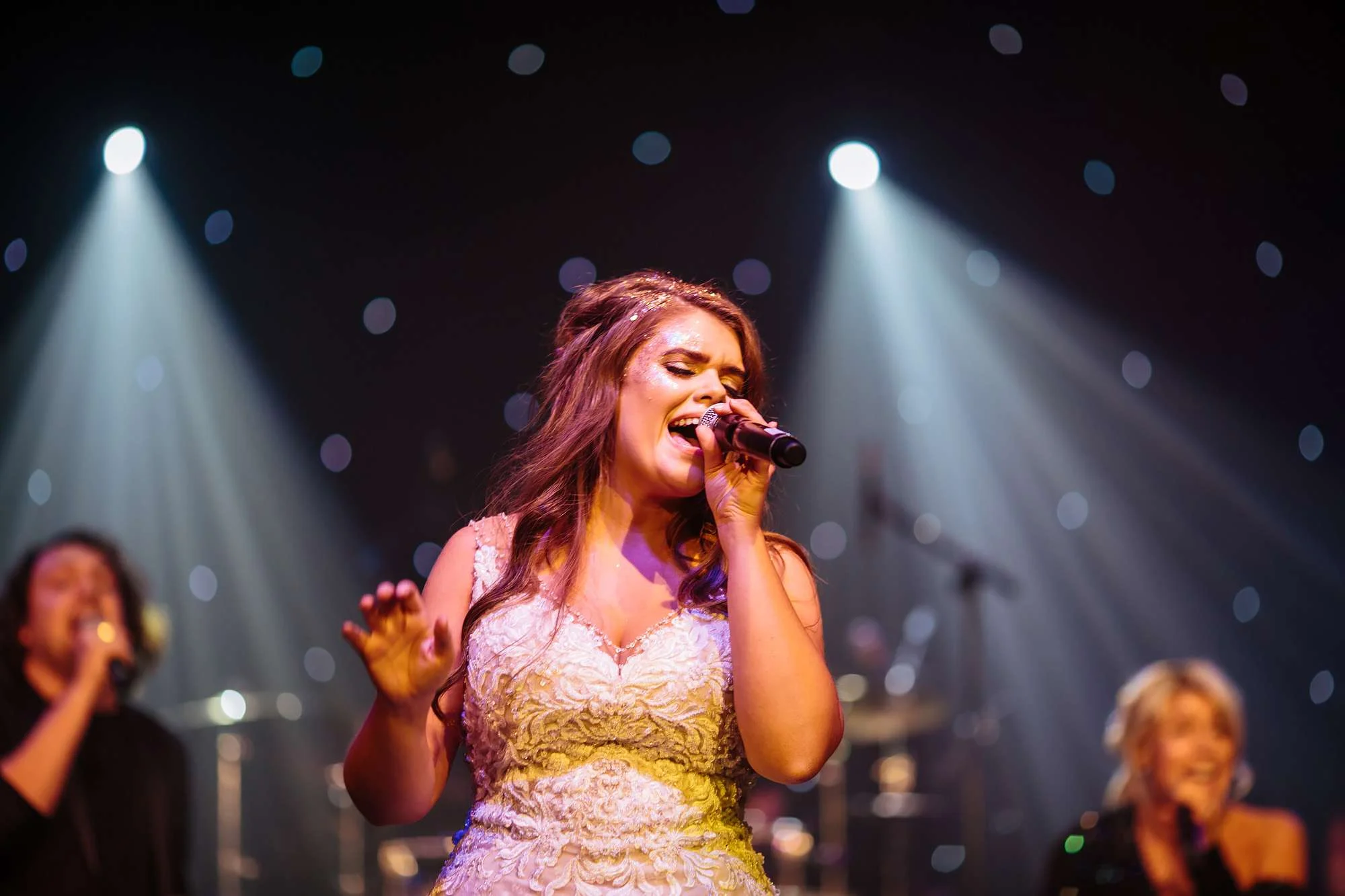 Bride performs with the band at her wedding in Blackpool