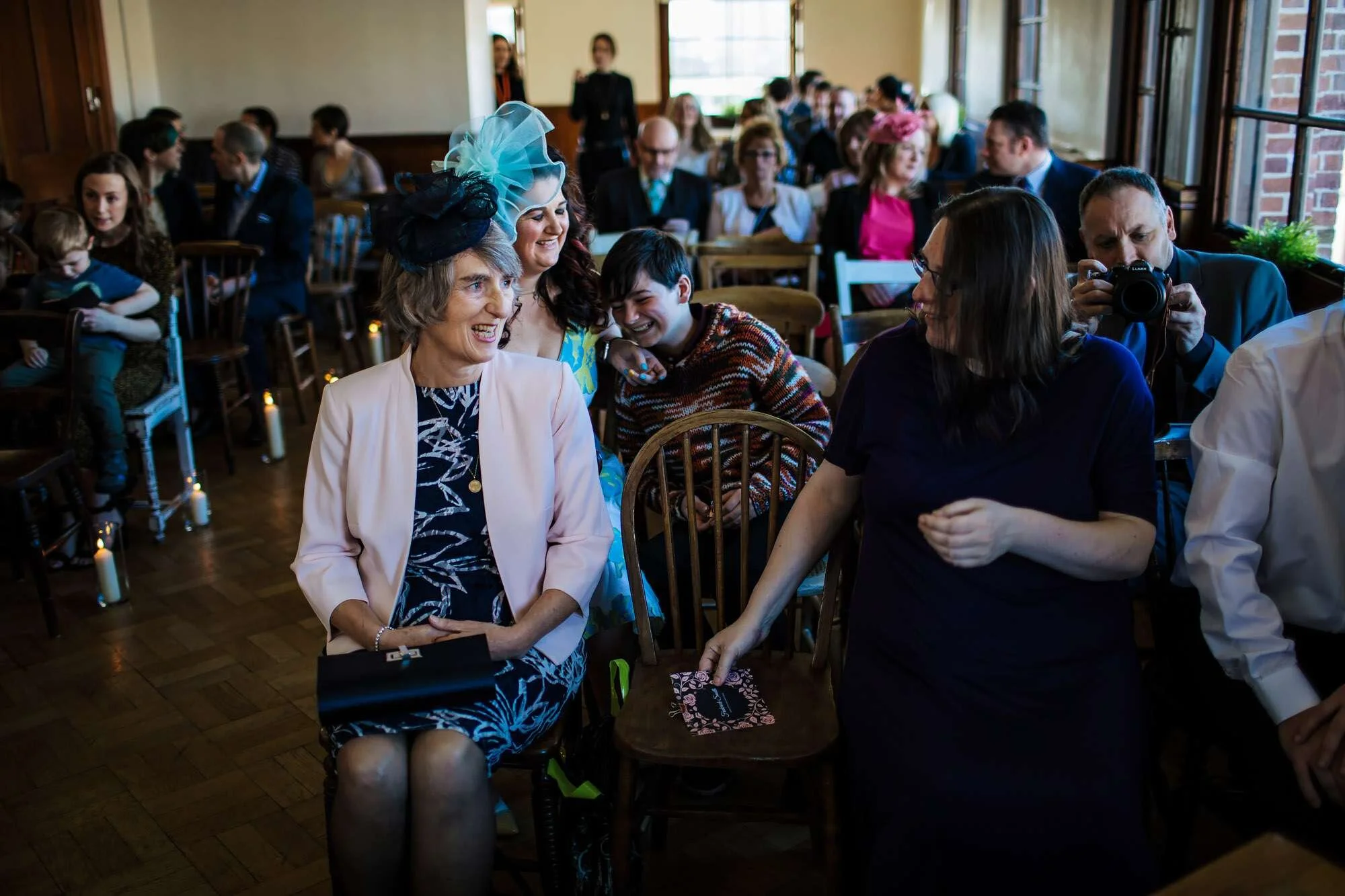 Brides mum smiles at the wedding ceremony