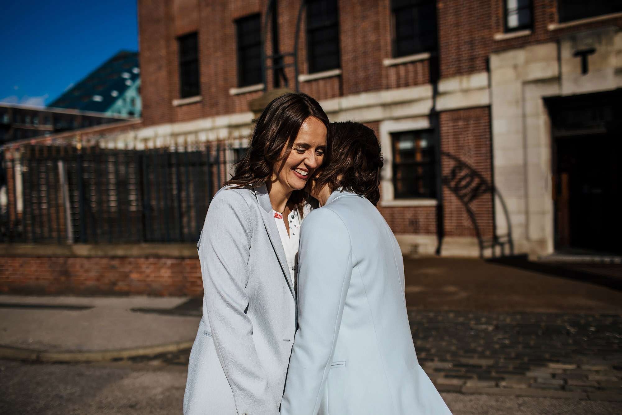 Two brides sharing a moment outside The Tetley Leeds