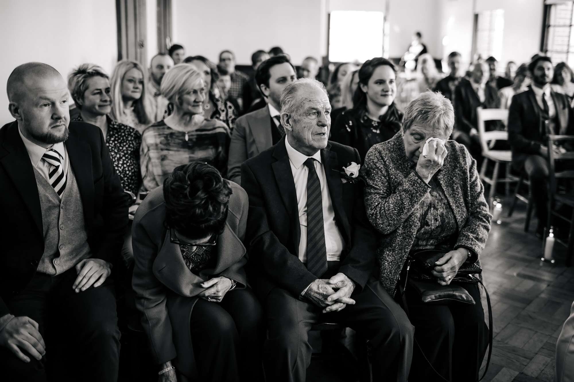 Wedding guests crying at the ceremony