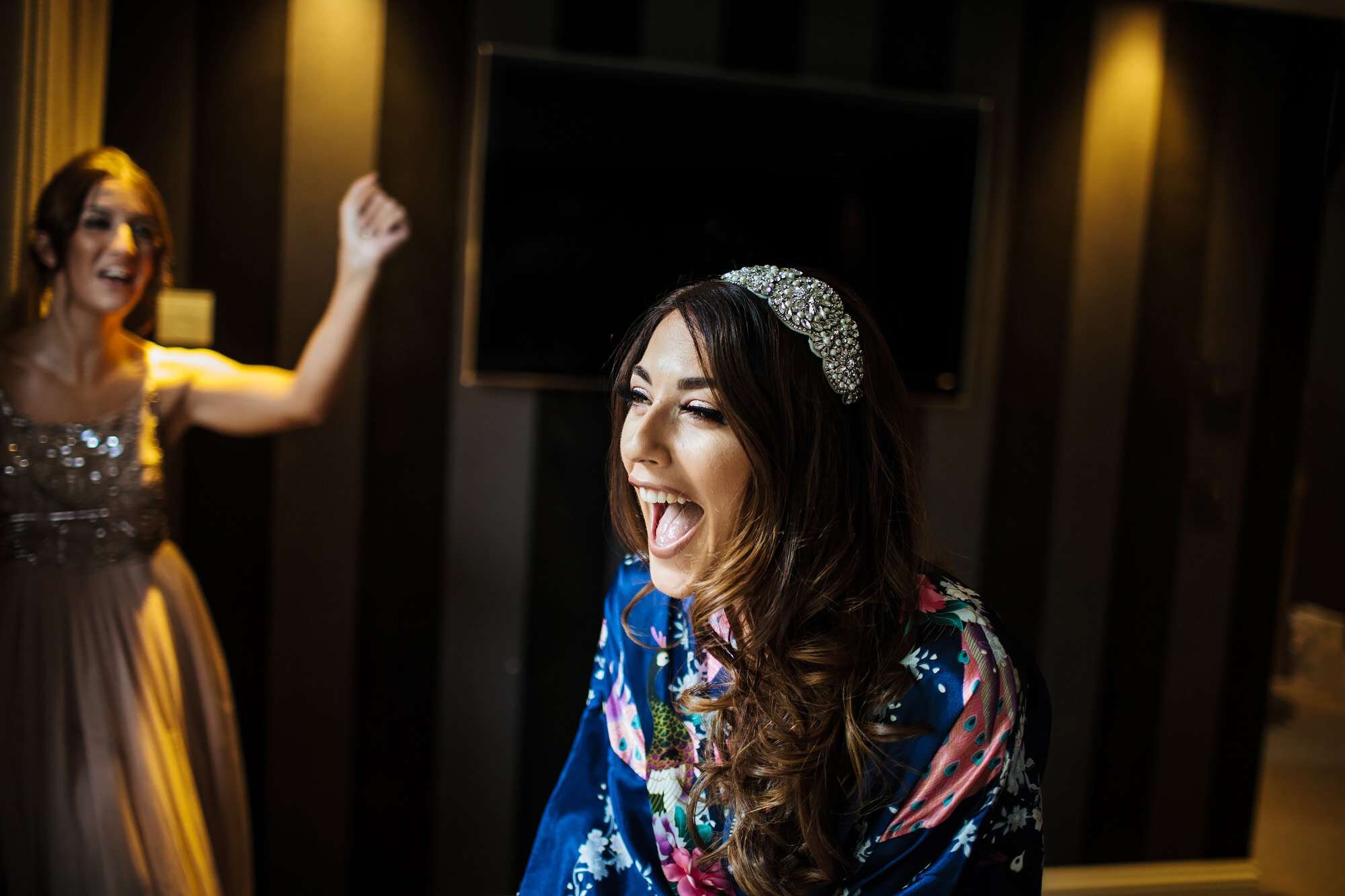 Bride laughing on her wedding morning