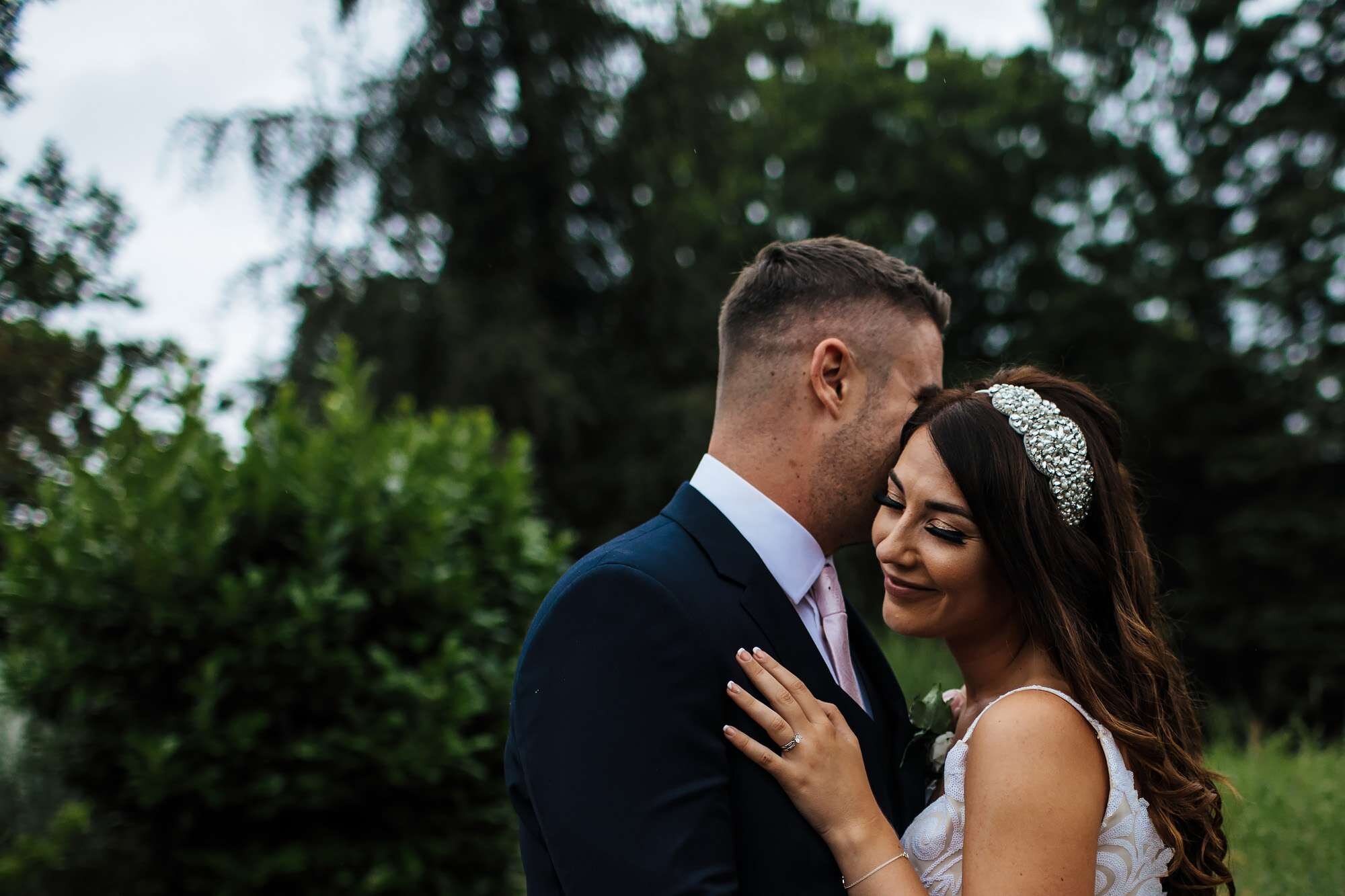 Bride and groom pose at Rudding Park 