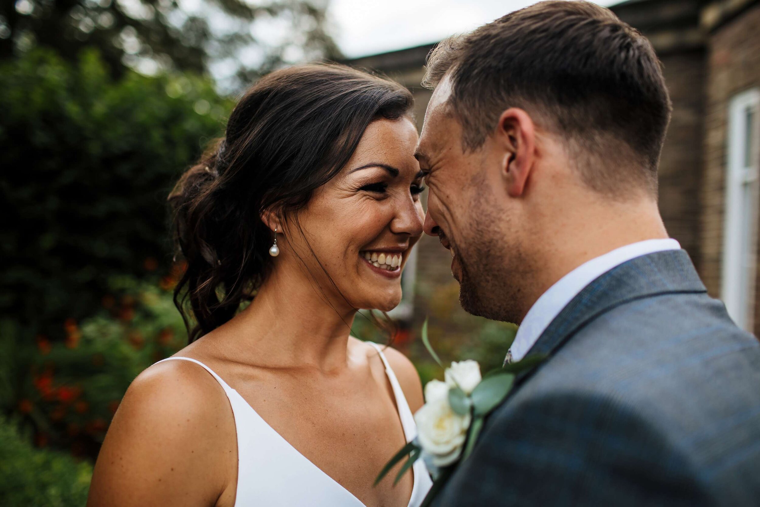 Bride and groom share a moment at their Yorkshire wedding