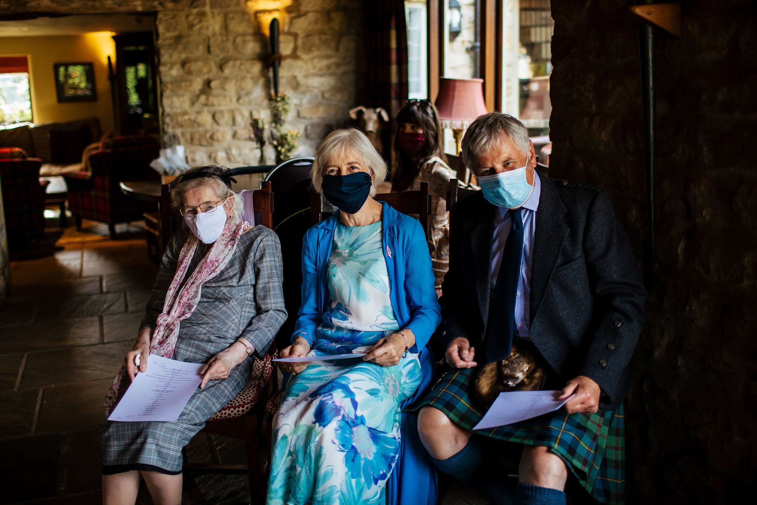 Wedding guests in face masks at The Star Inn Harome