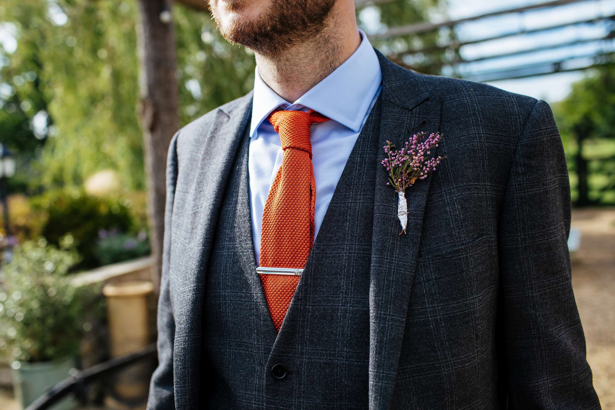Detail of the grooms suit at his wedding
