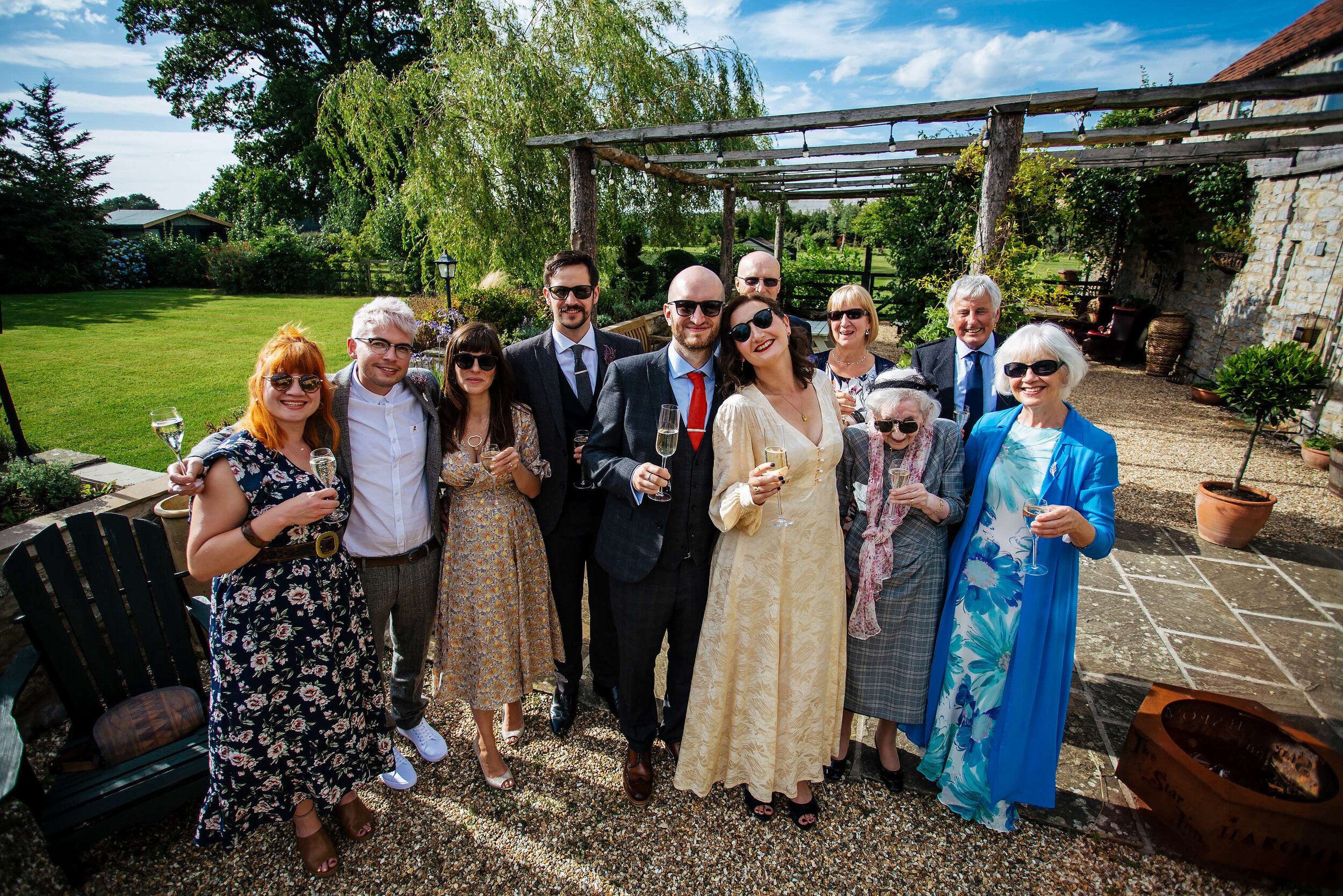 Group shot of a wedding at The Star Inn Harome