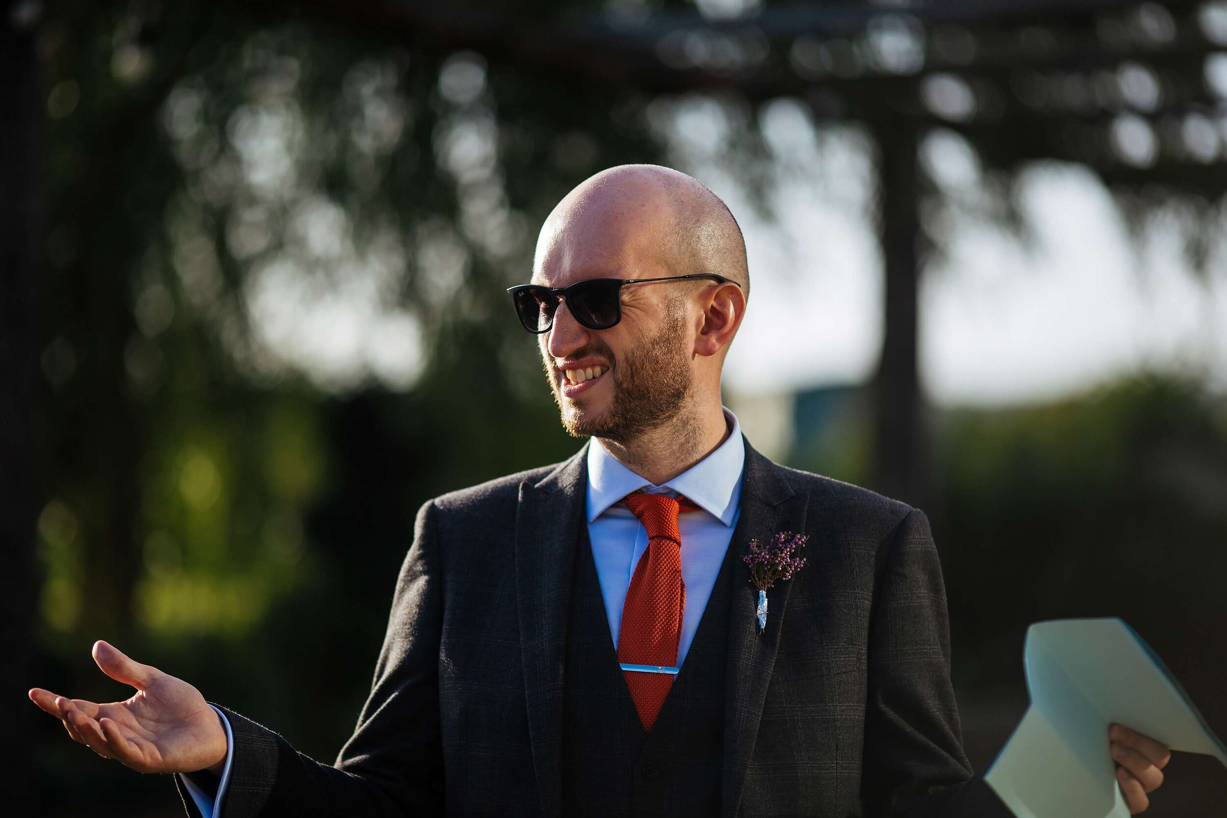 Groom performs his speech with sunglasses