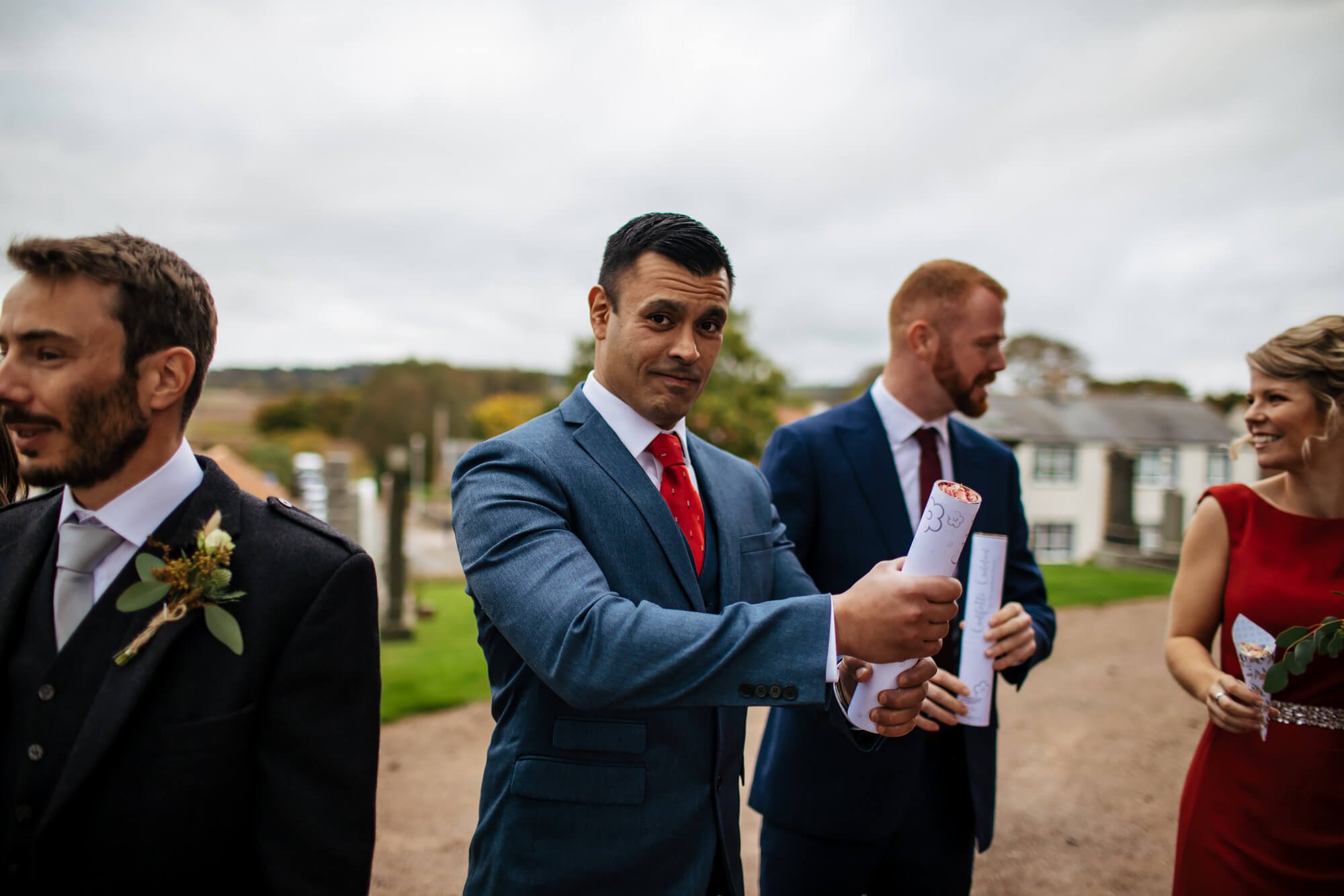 Wedding guests with confetti canons