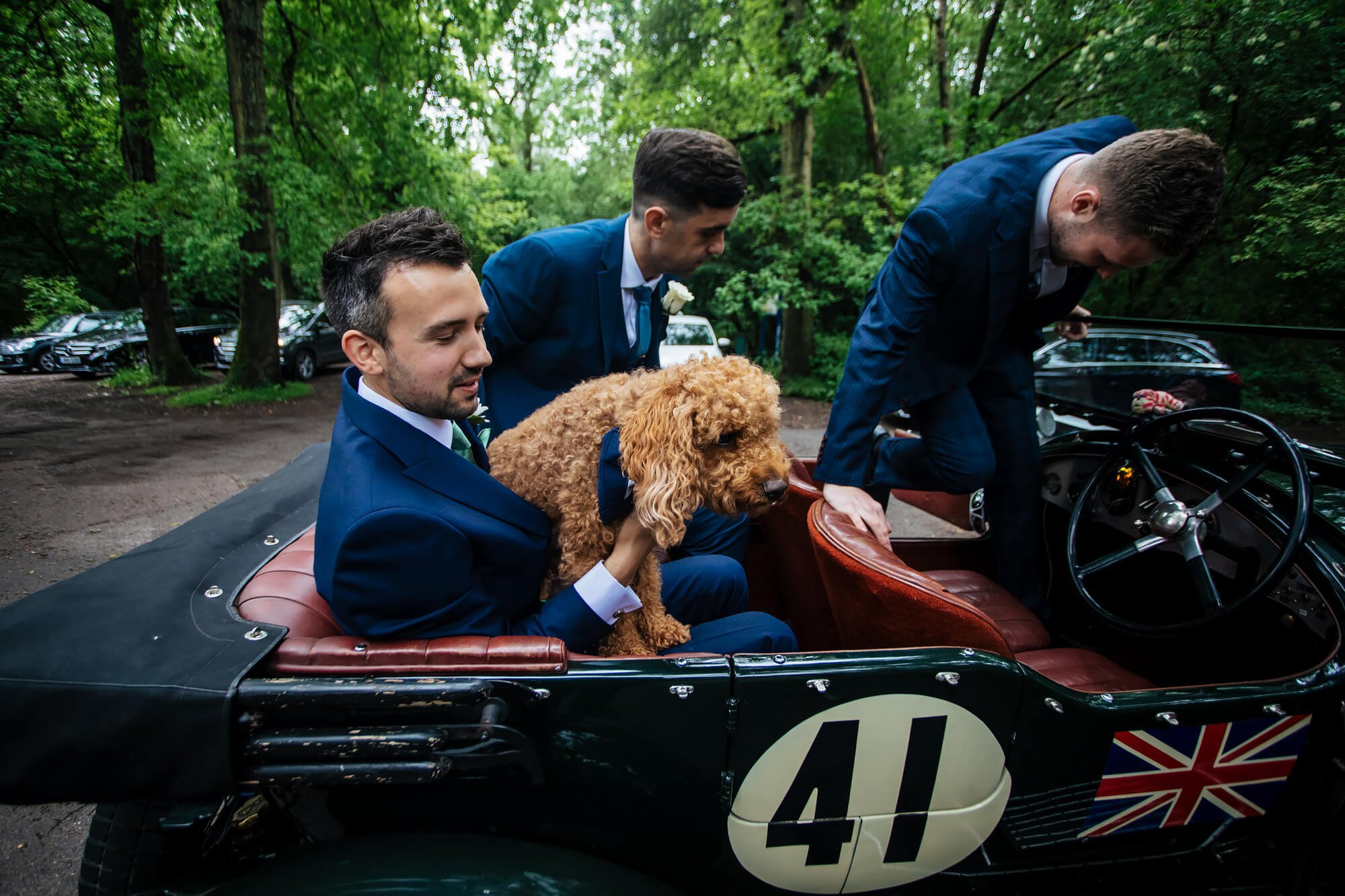 Groom and dog arriving at the wedding in Kent