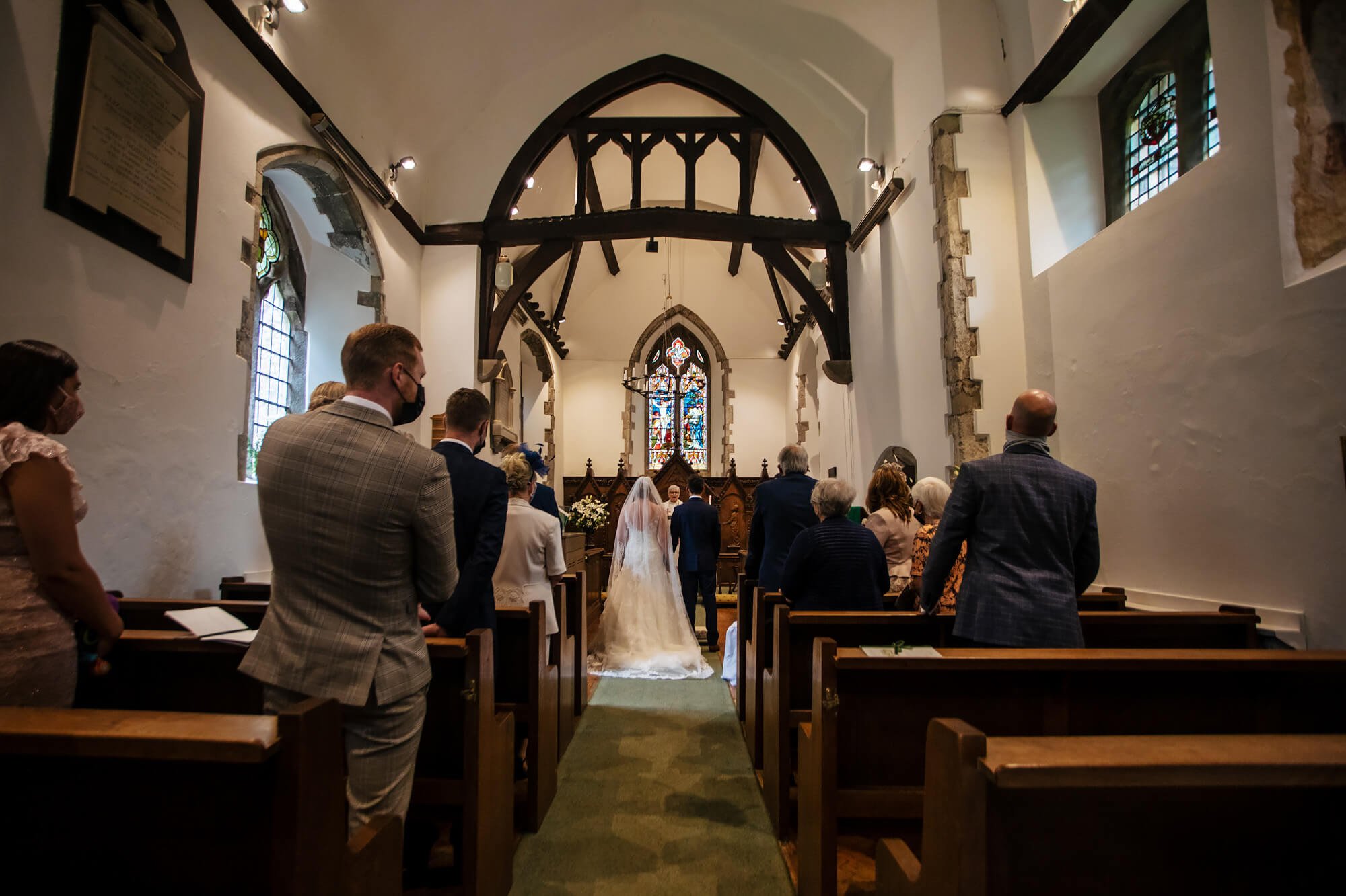 Bride and groom and the end of the church aisle