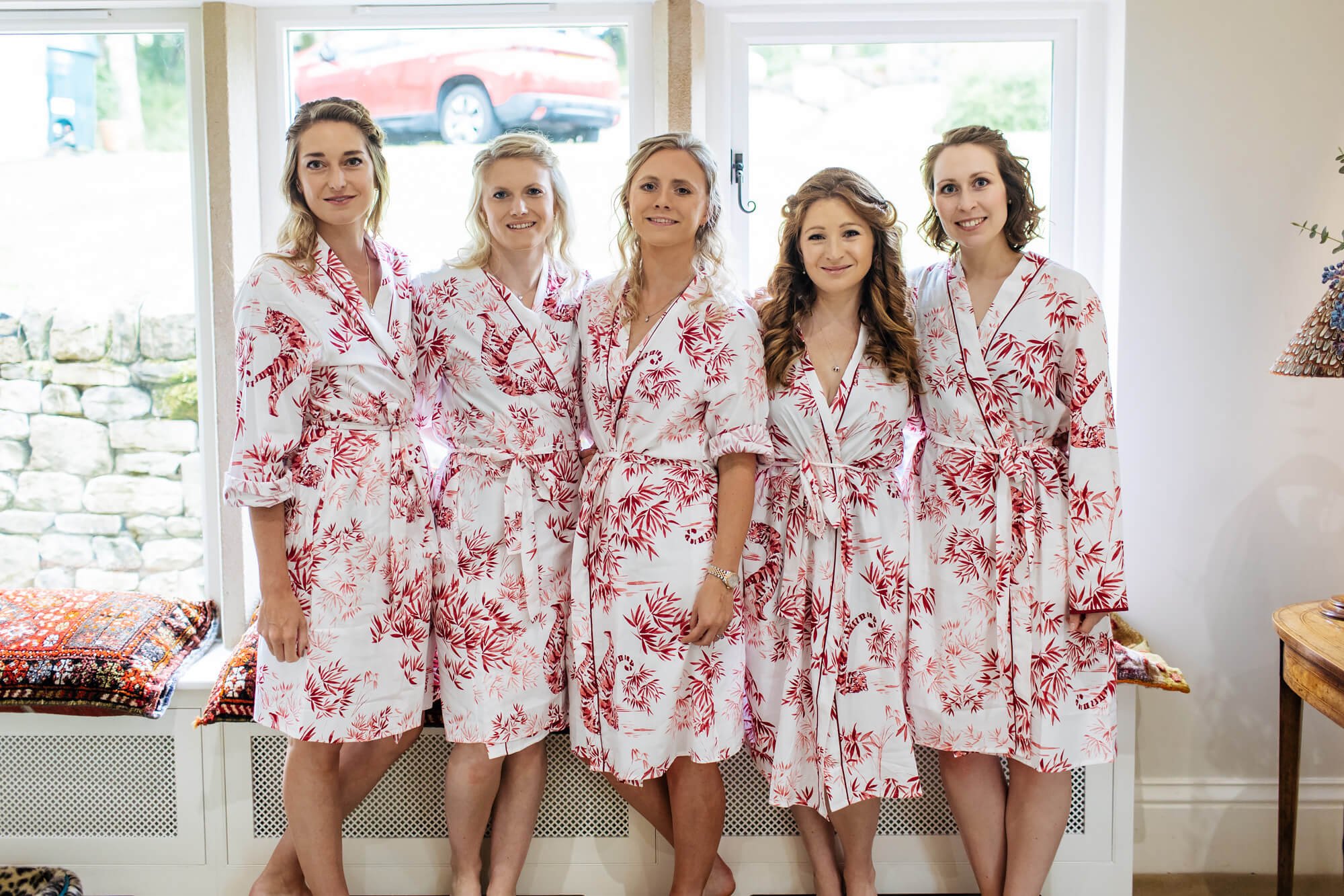 Bridesmaids posing in their dressing gowns