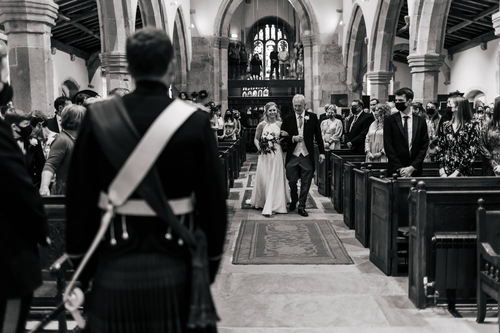 Bride and dad walk down the aisle in Yorkshire