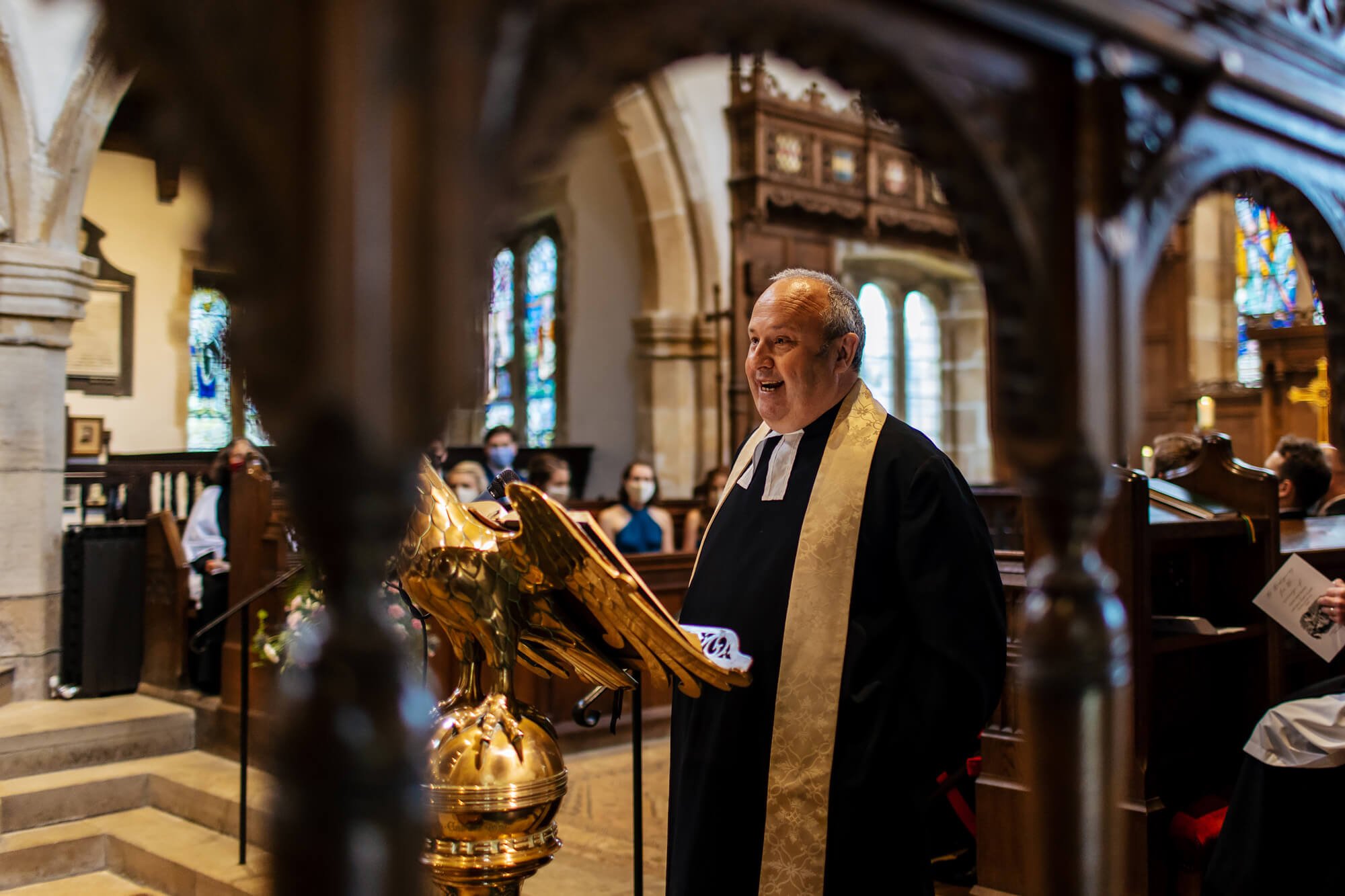 Church vicar performs the wedding ceremony