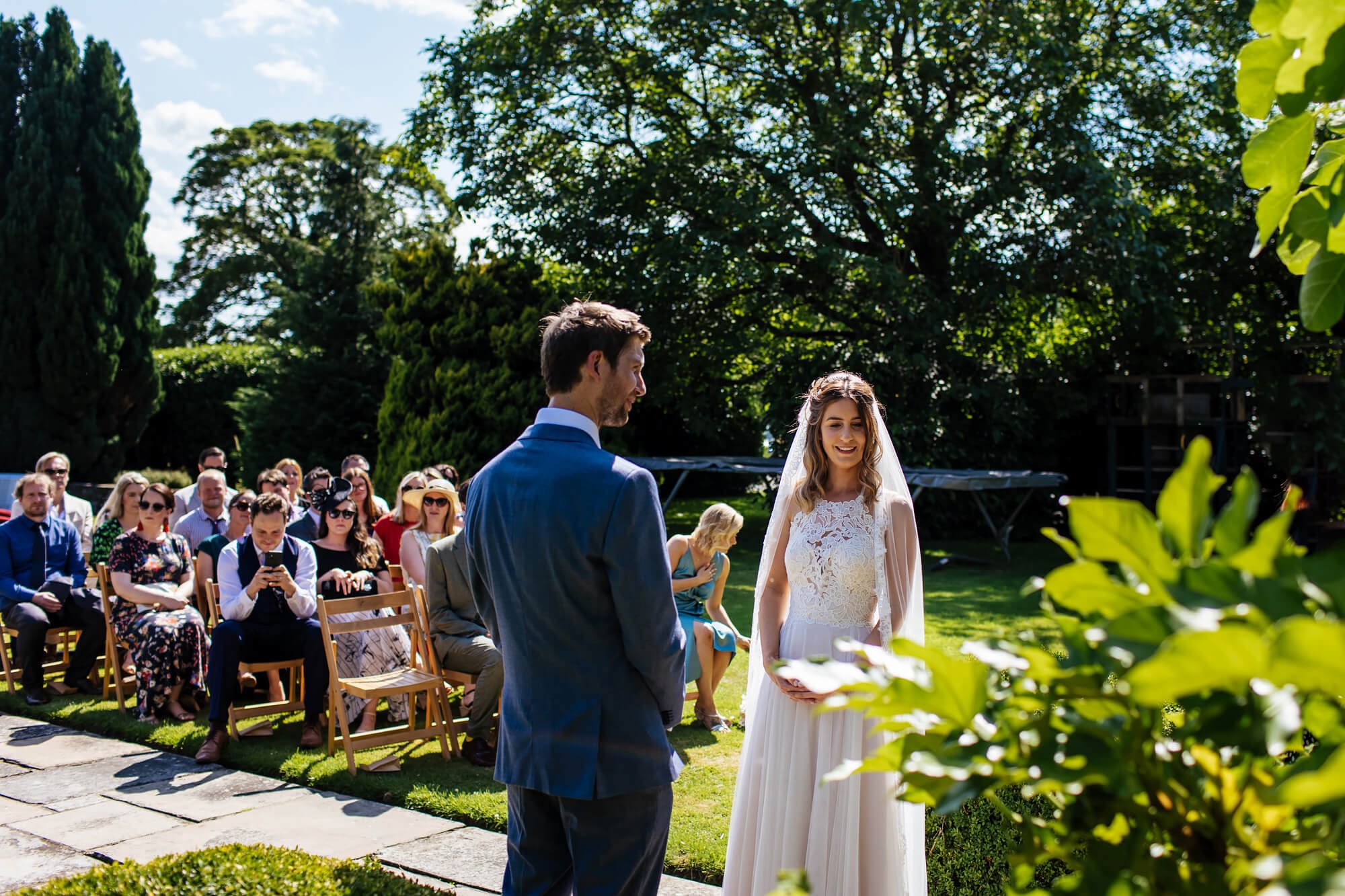 Bride and groom saying their vows at a Crayke Manor wedding