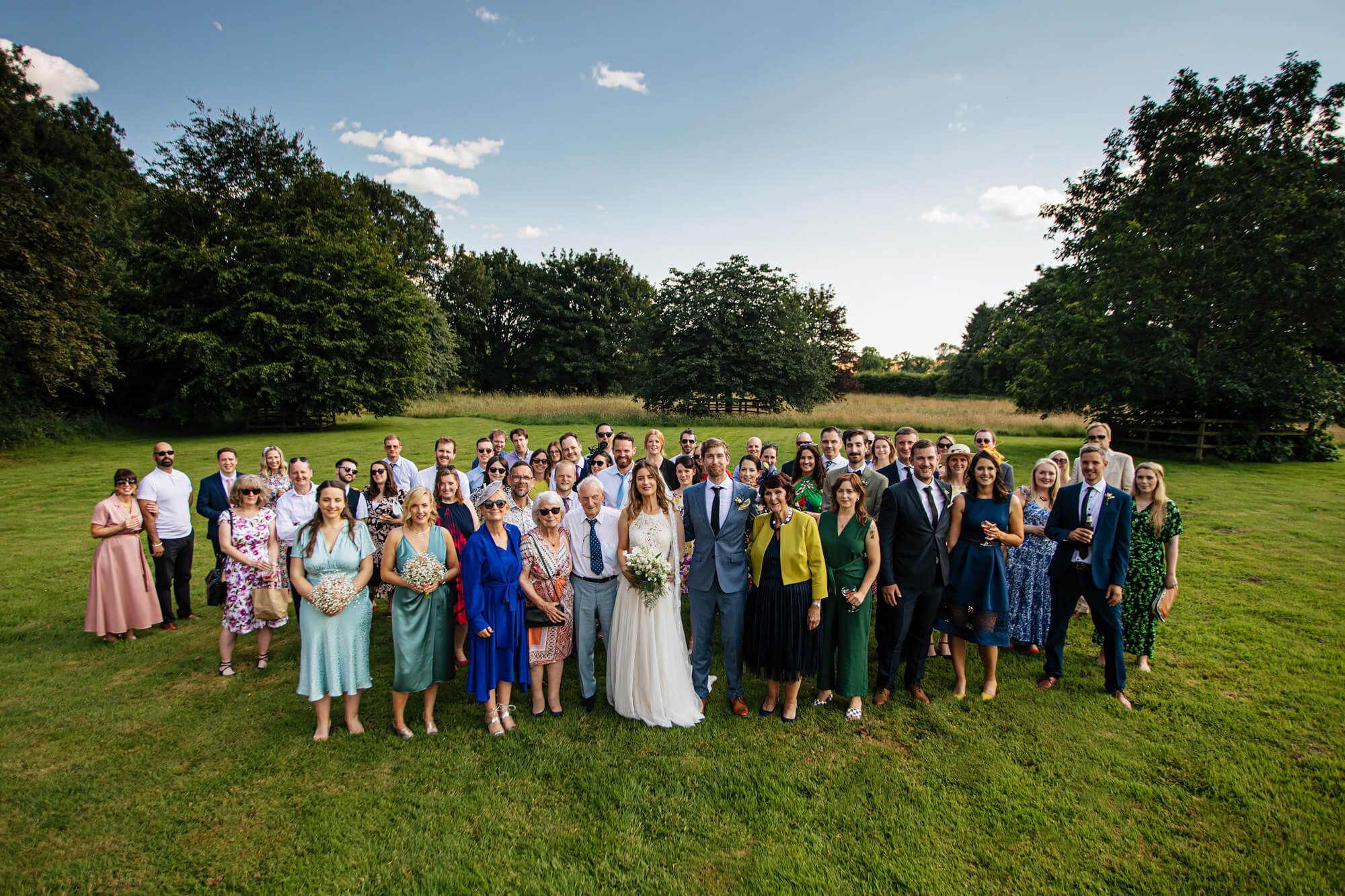 A group shot of all the wedding guests at Crayke Manor