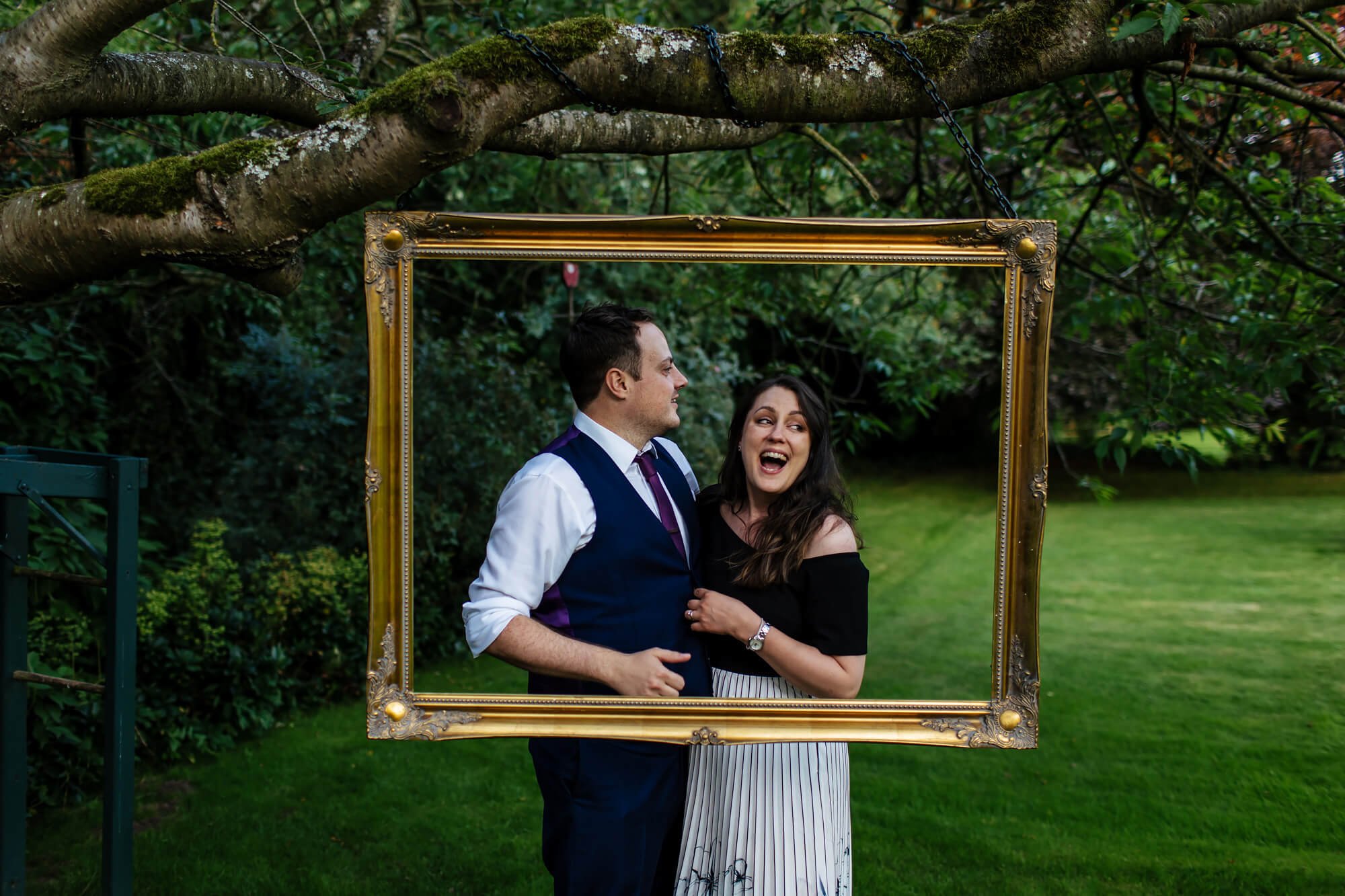 Wedding guests in a hanging picture frame
