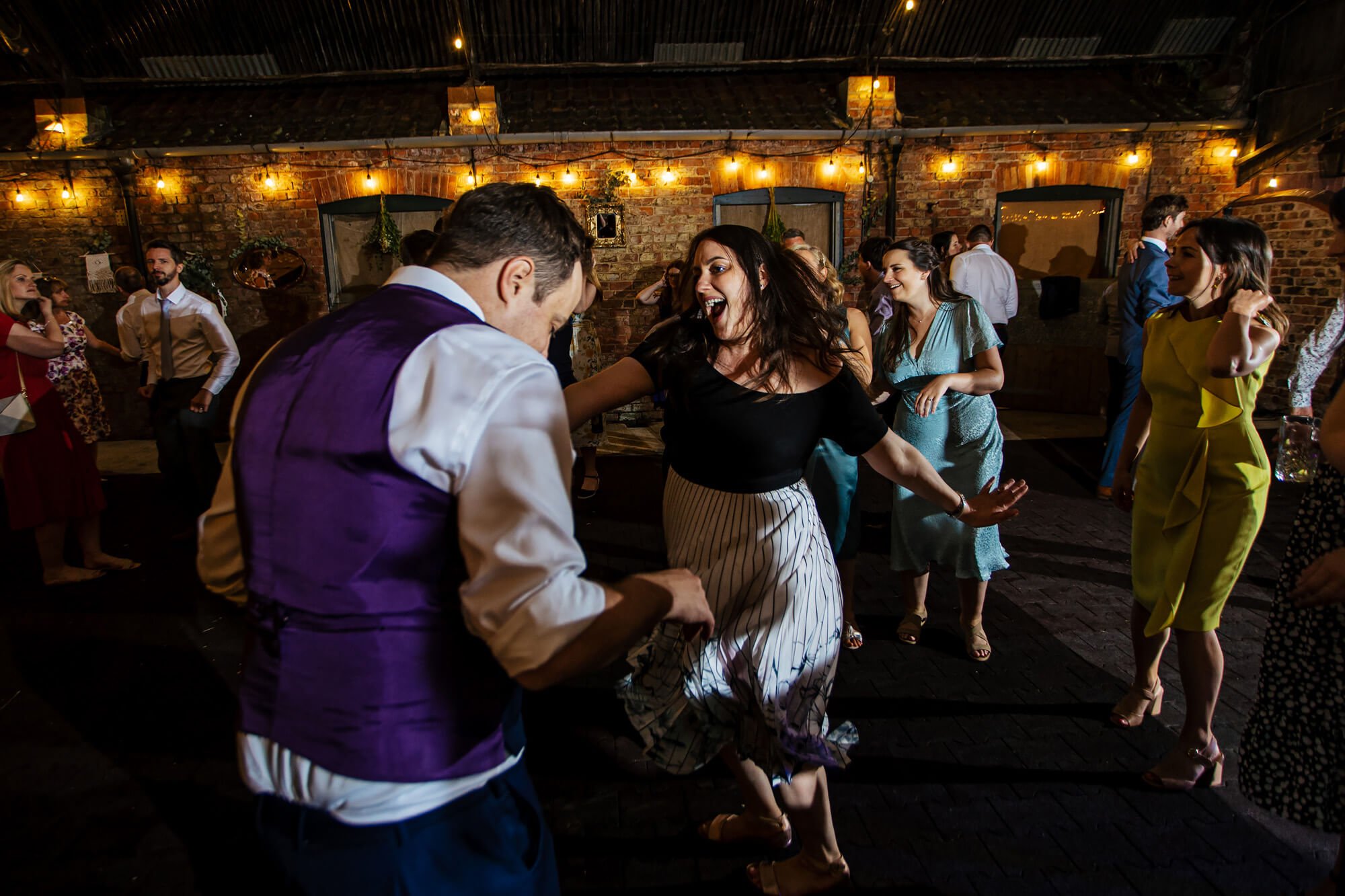 Wedding guests dancing in Yorkshire