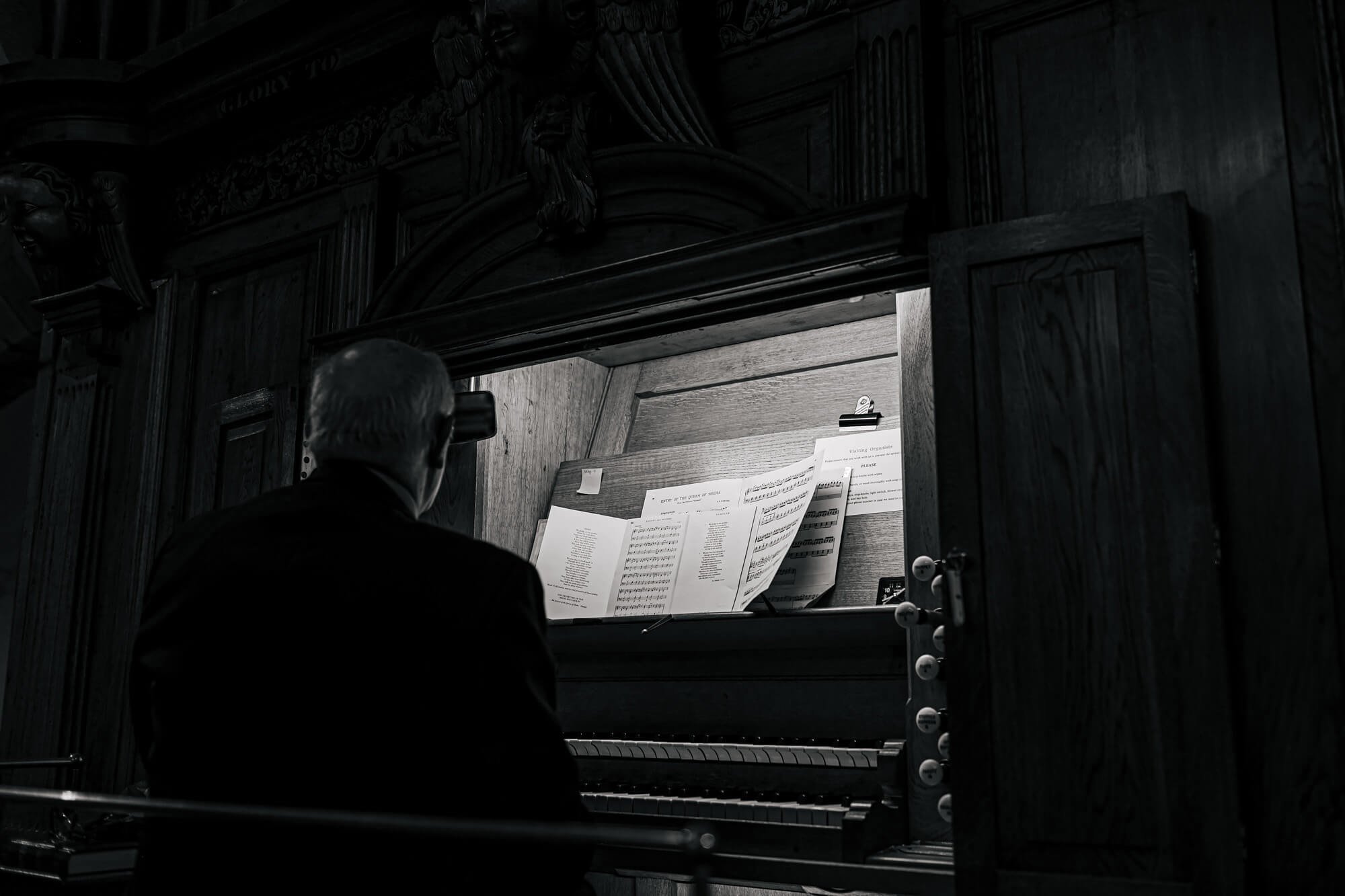 The church organist performs for a Cumbrian wedding