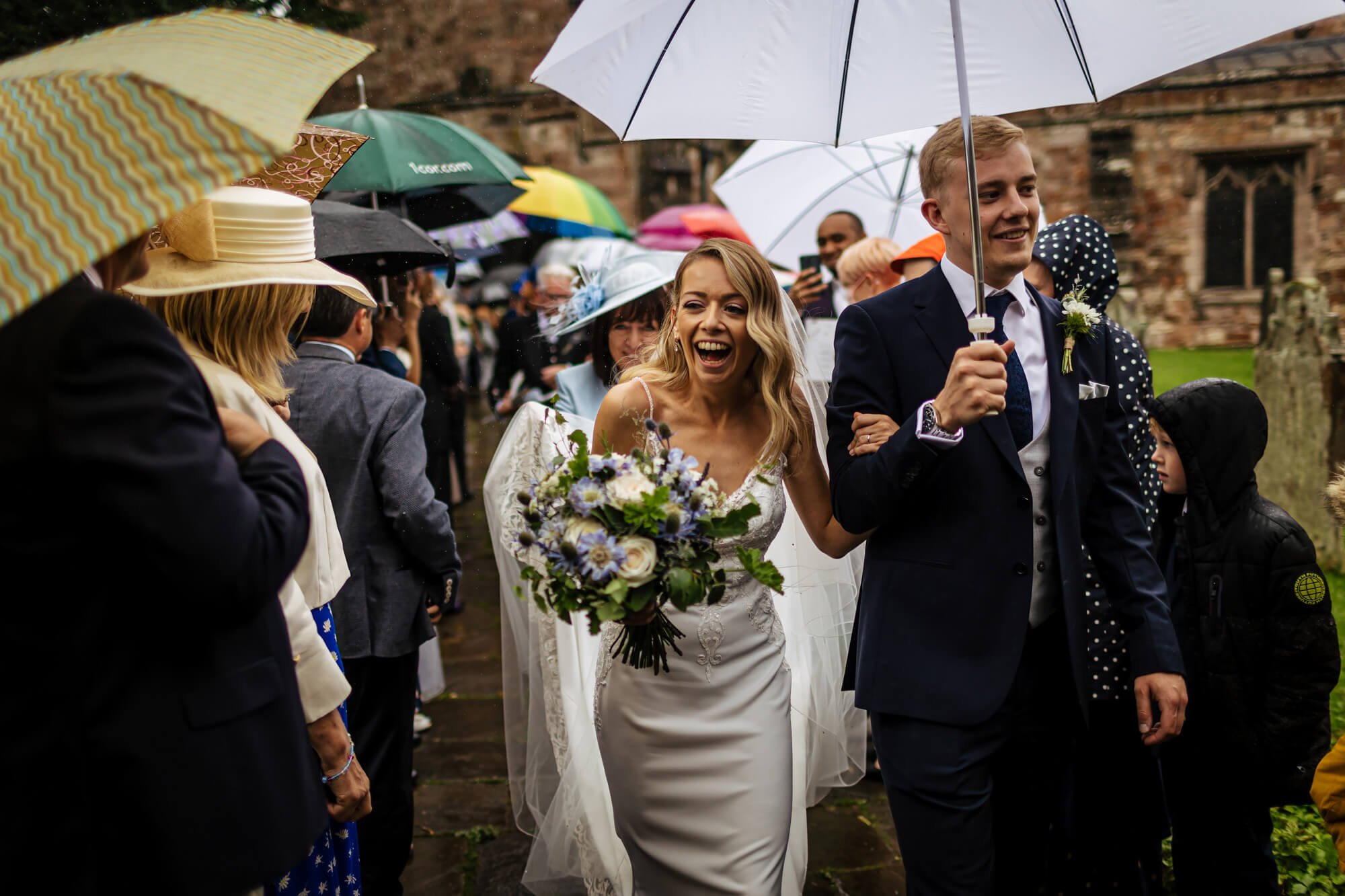 Bride and groom laughing at their wedding in Appleby