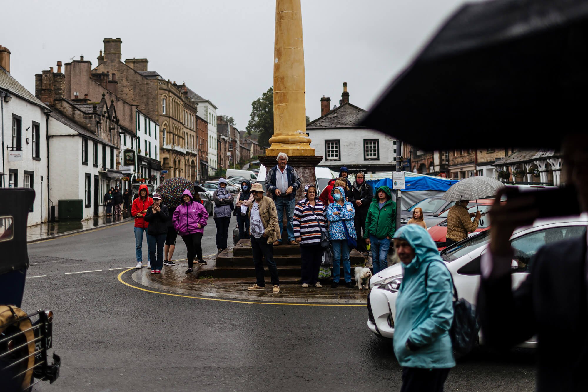 Onlookers outside a wedding in Appleby town square