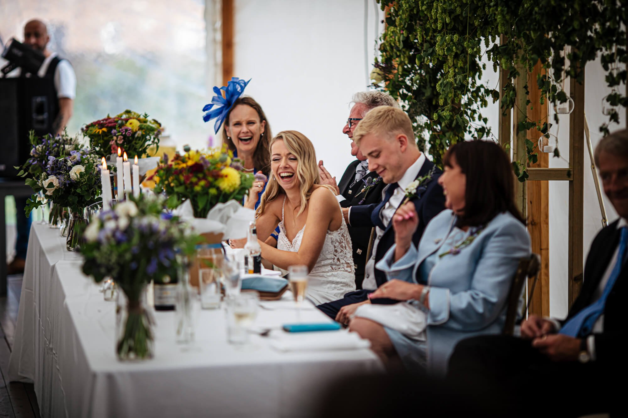 Bride laughing at her wedding