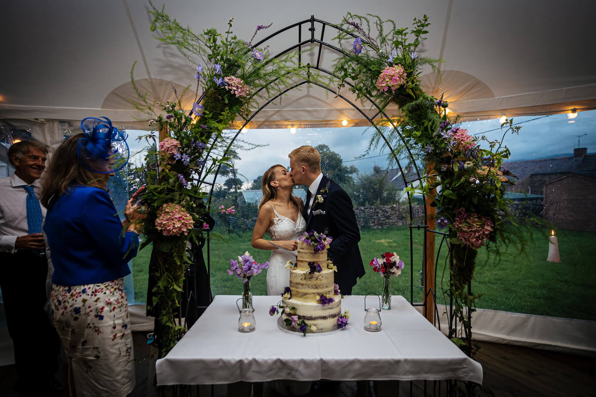 Bride and groom share a kiss on their wedding day